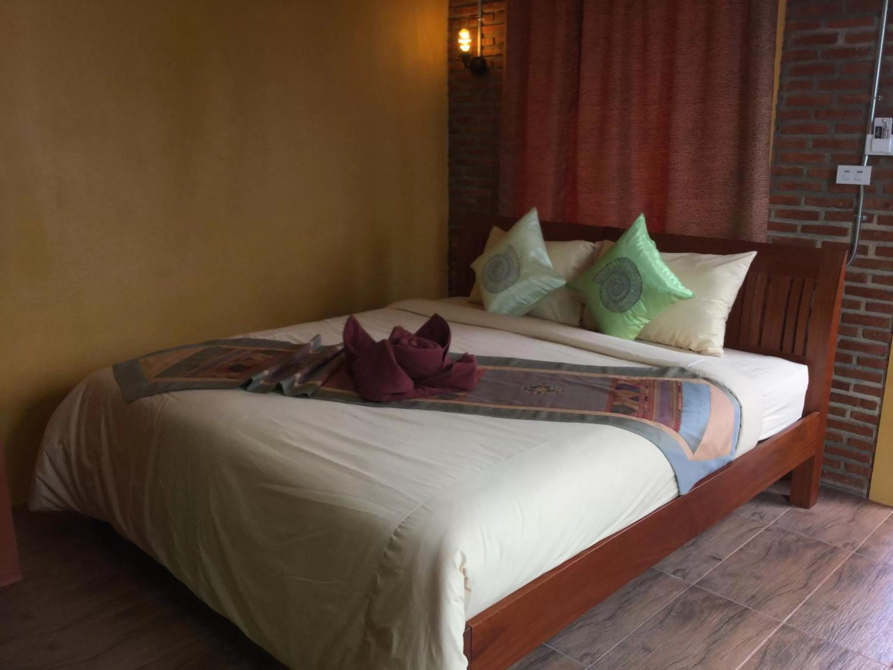 Bed in Pongphen Guesthouse - SHA Plus Certified