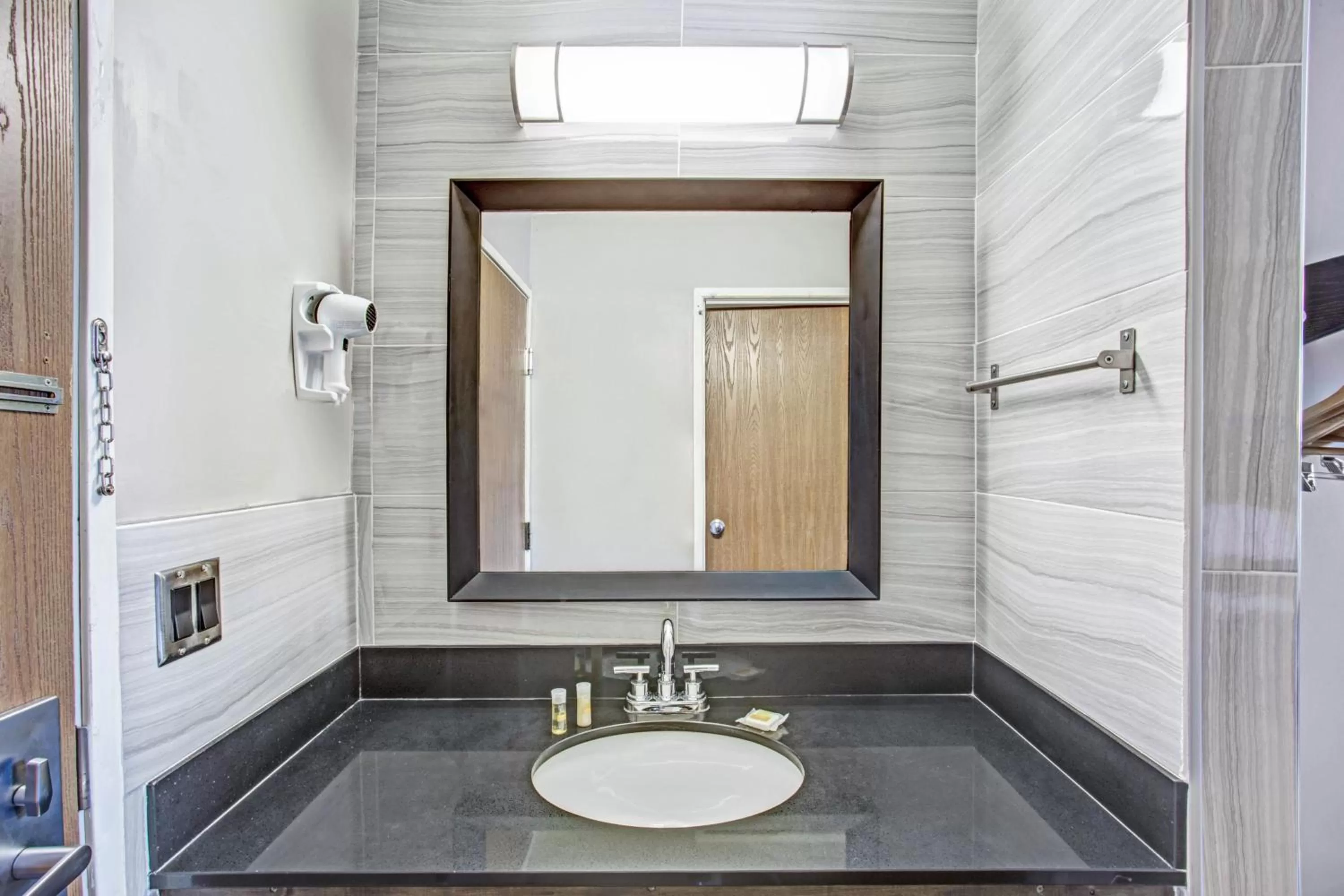 Bathroom in Days Inn by Wyndham Great Lakes Naval Base