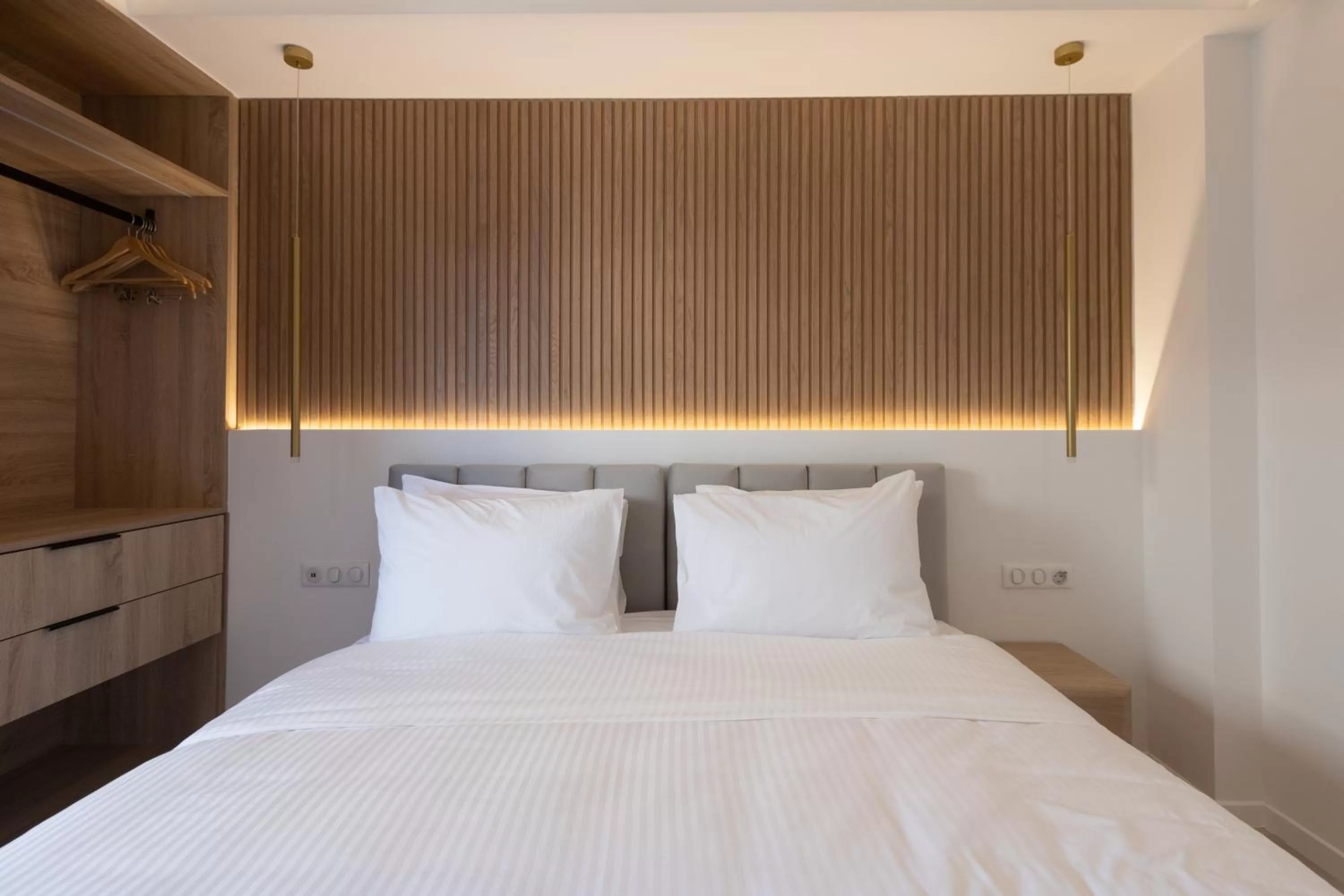 Bed in Incanto Boutique Suites - Neos Kosmos