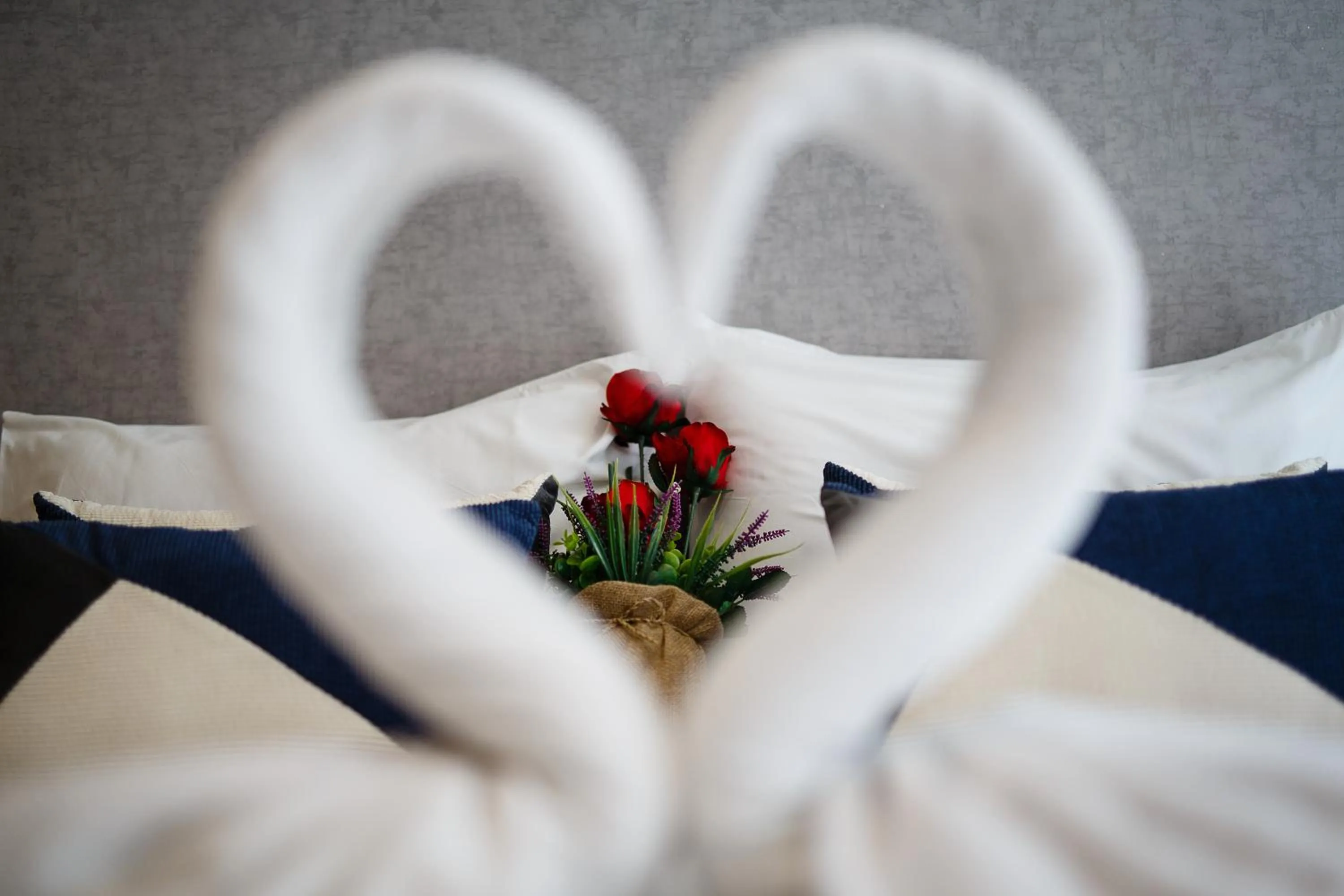 Bed in Platinum Hotel and Apartments