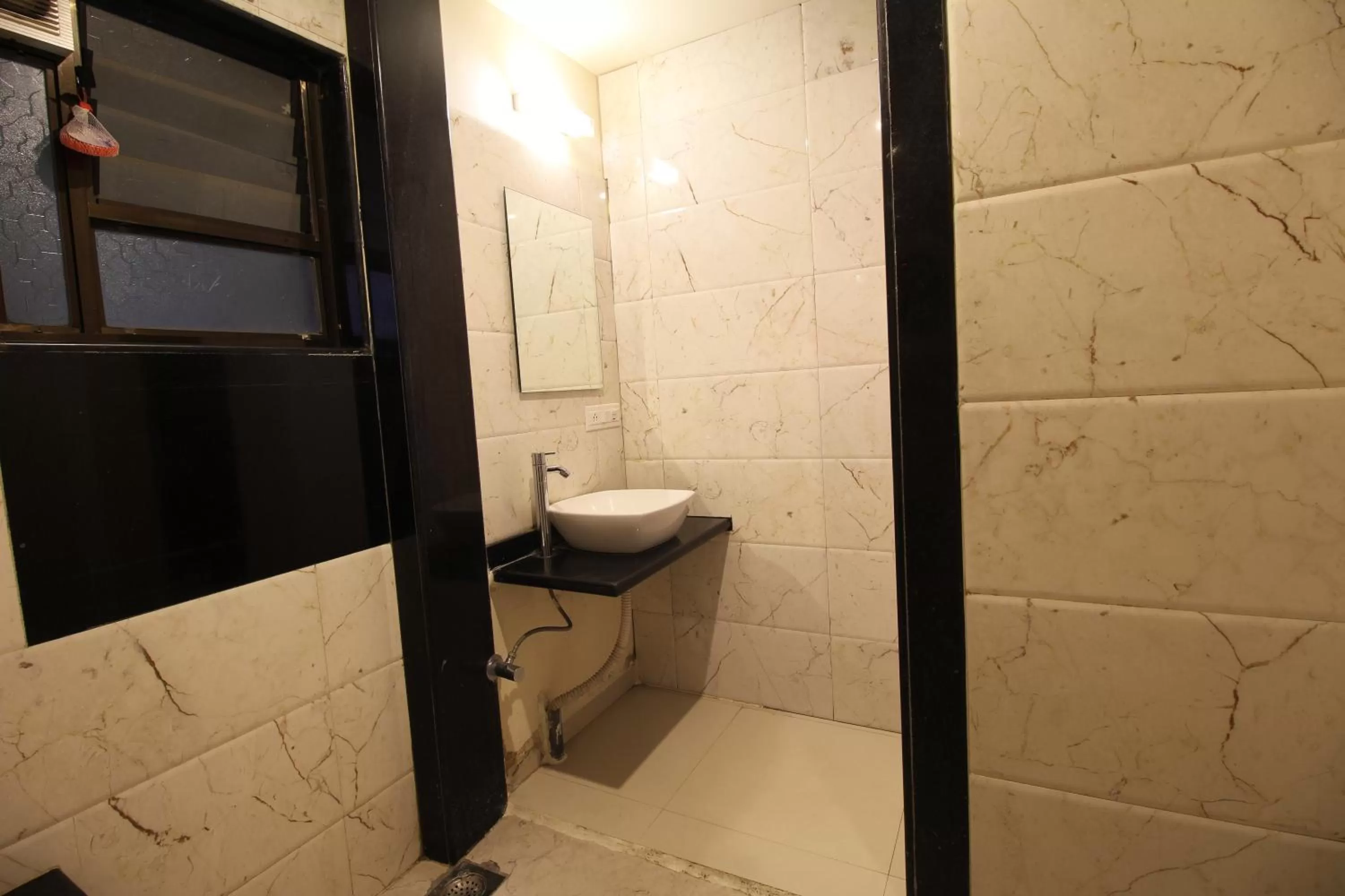 Bathroom in Hotel Sham Suman, Kolhapur- Opposite To Mahalaxmi Temple