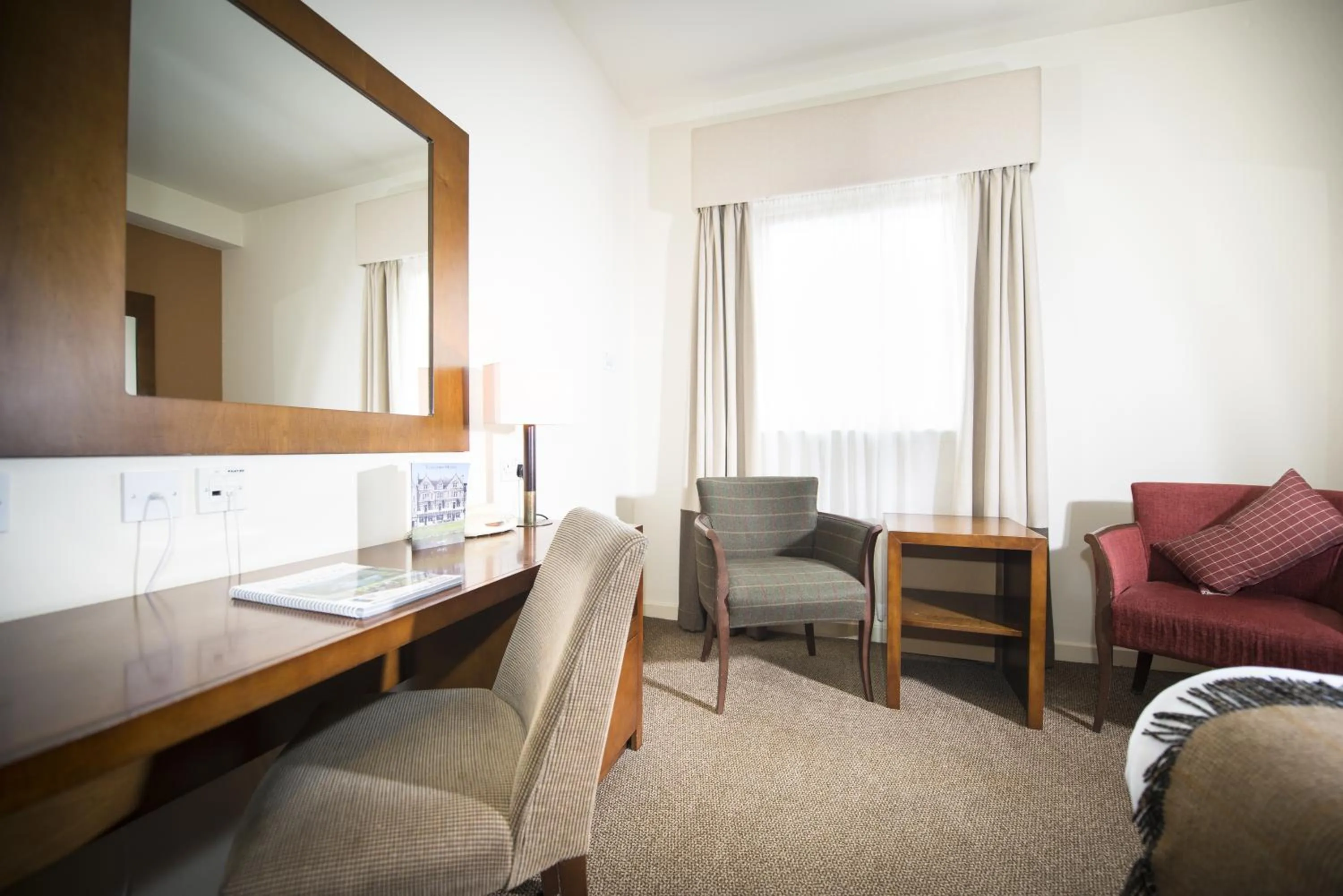 Seating area in Columba Hotel Inverness by Compass Hospitality