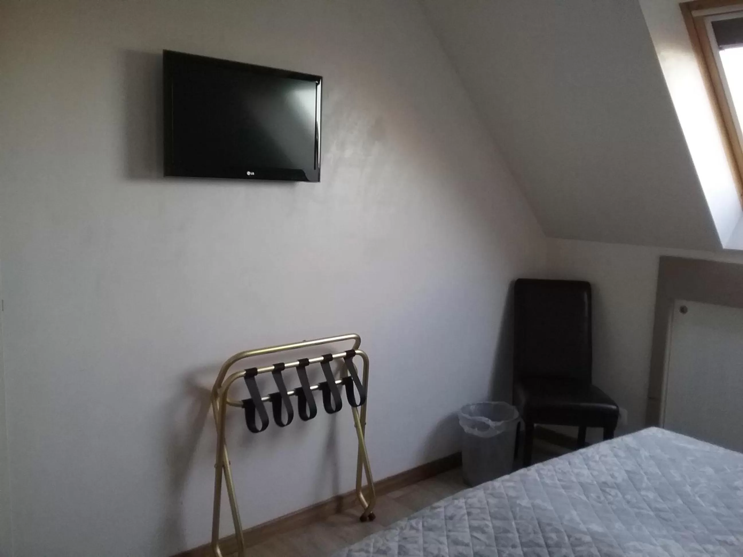 Bedroom, TV/Entertainment Center in B&B 't Hemelbedje