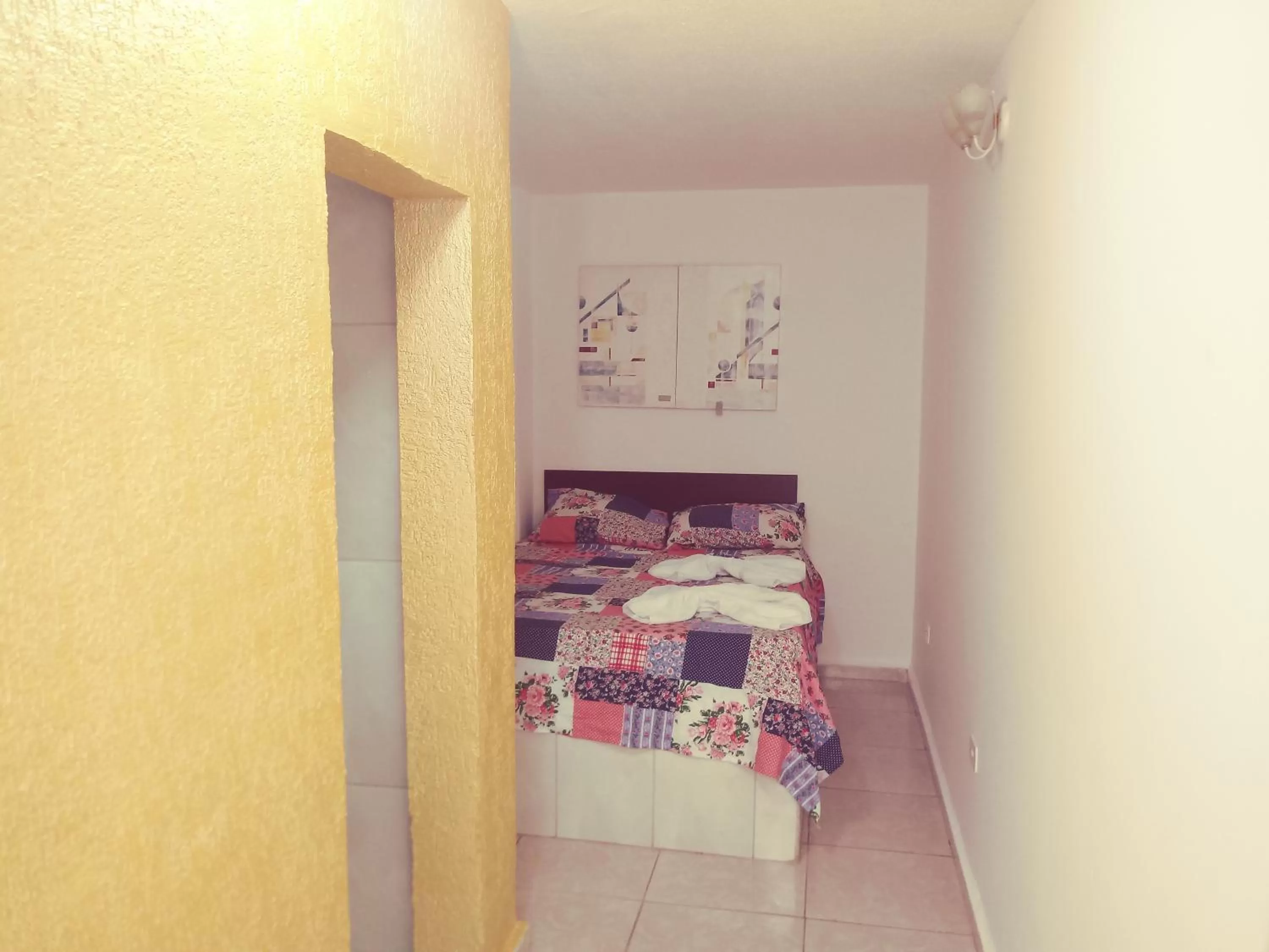 Bed in Pousada Villas