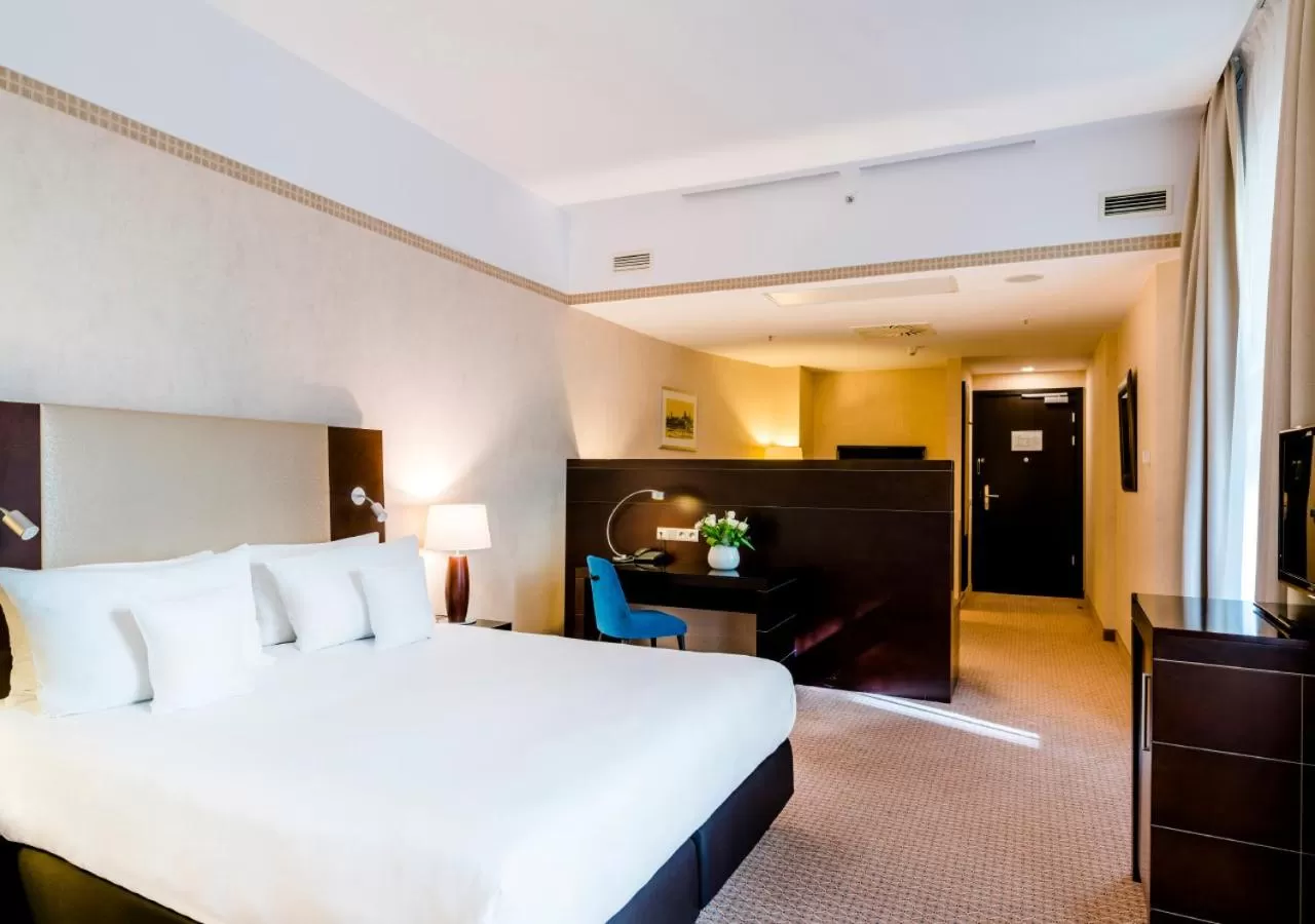 Bed in Hotel Polonia Palace