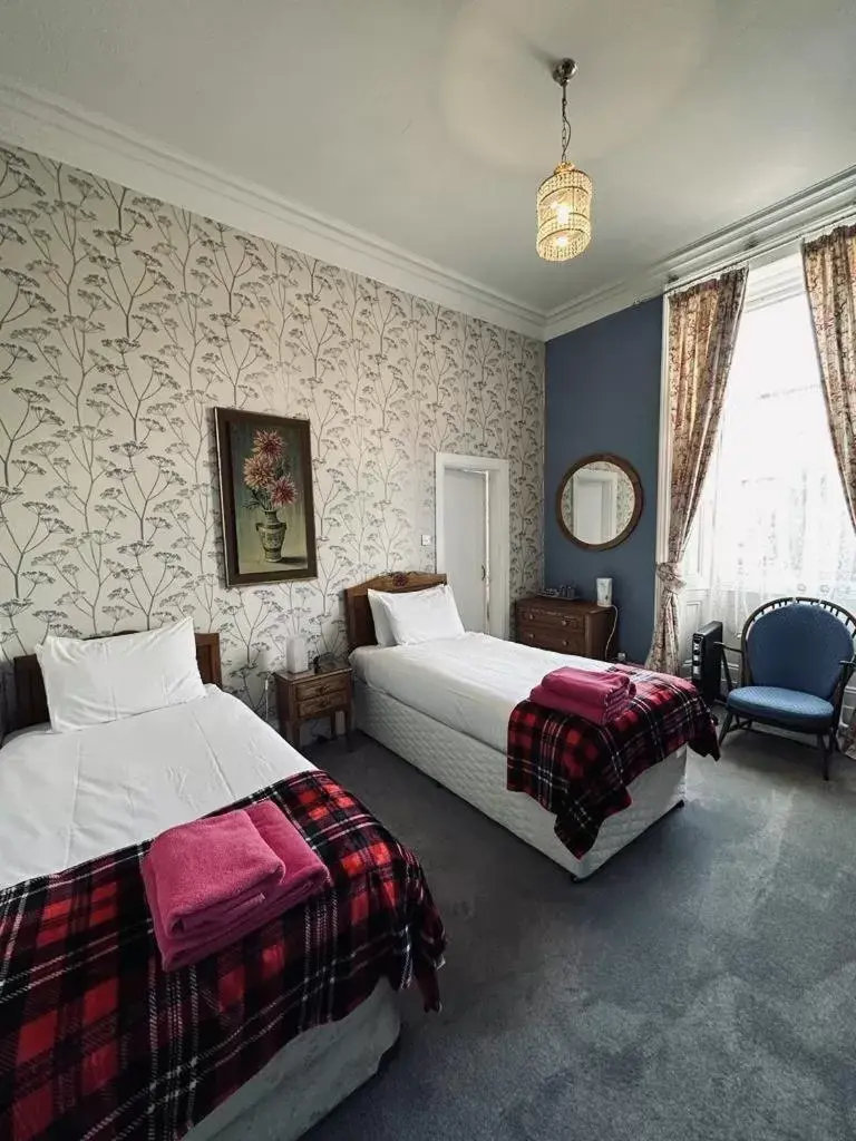 Standard Triple Room in Eliza House Standard Triple Room in Eliza House