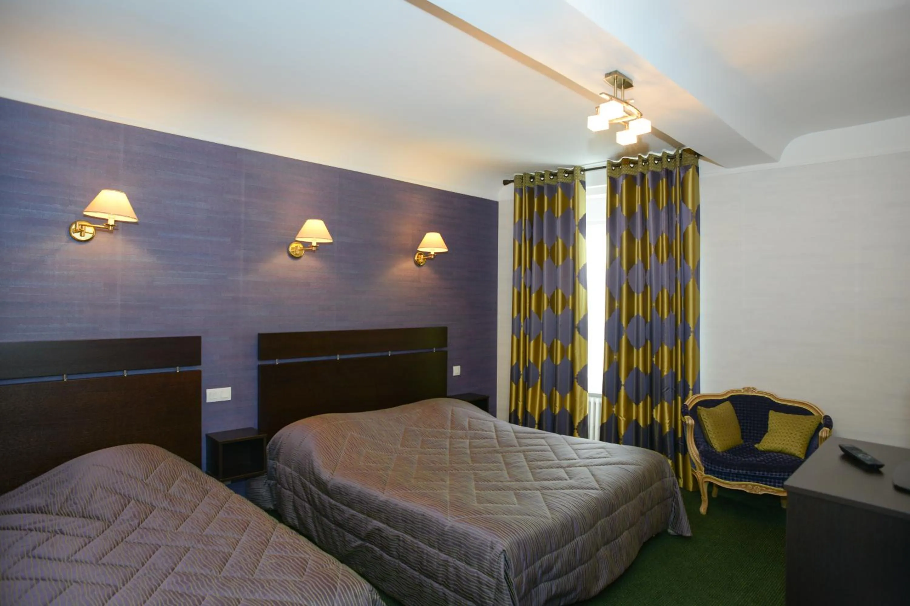 Photo of the whole room, Bed in Hôtel de La Croix d'Or