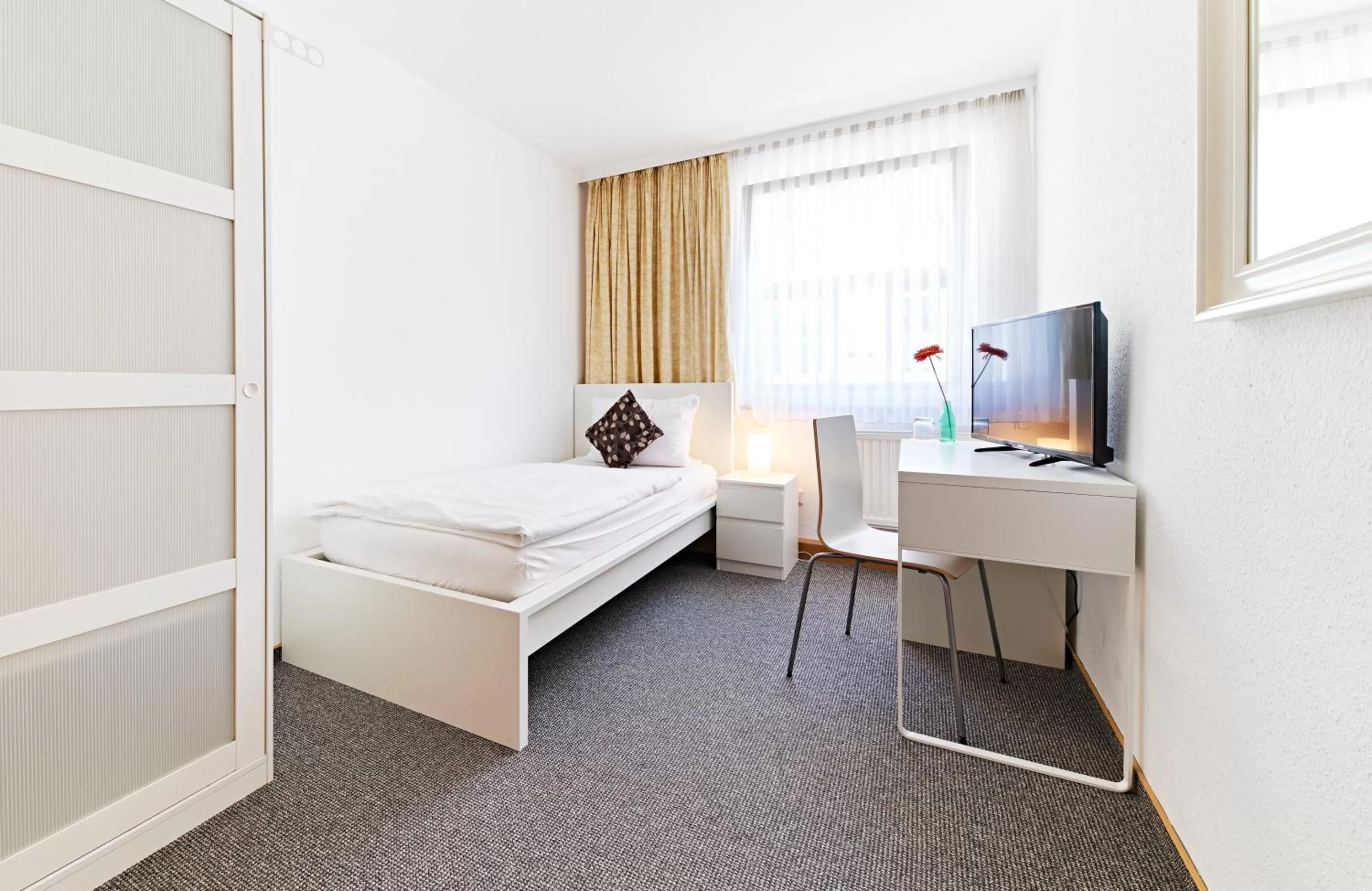 Photo of the whole room, Bed in Altstadthotel Fürth