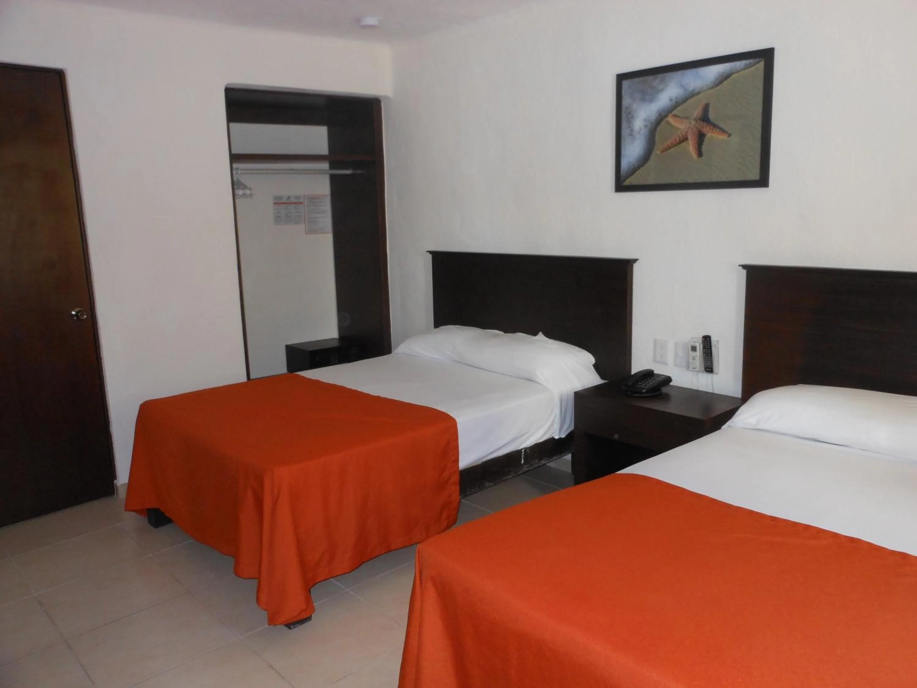 Photo of the whole room, Bed in Costa Club Punta Arena - Todo Incluido