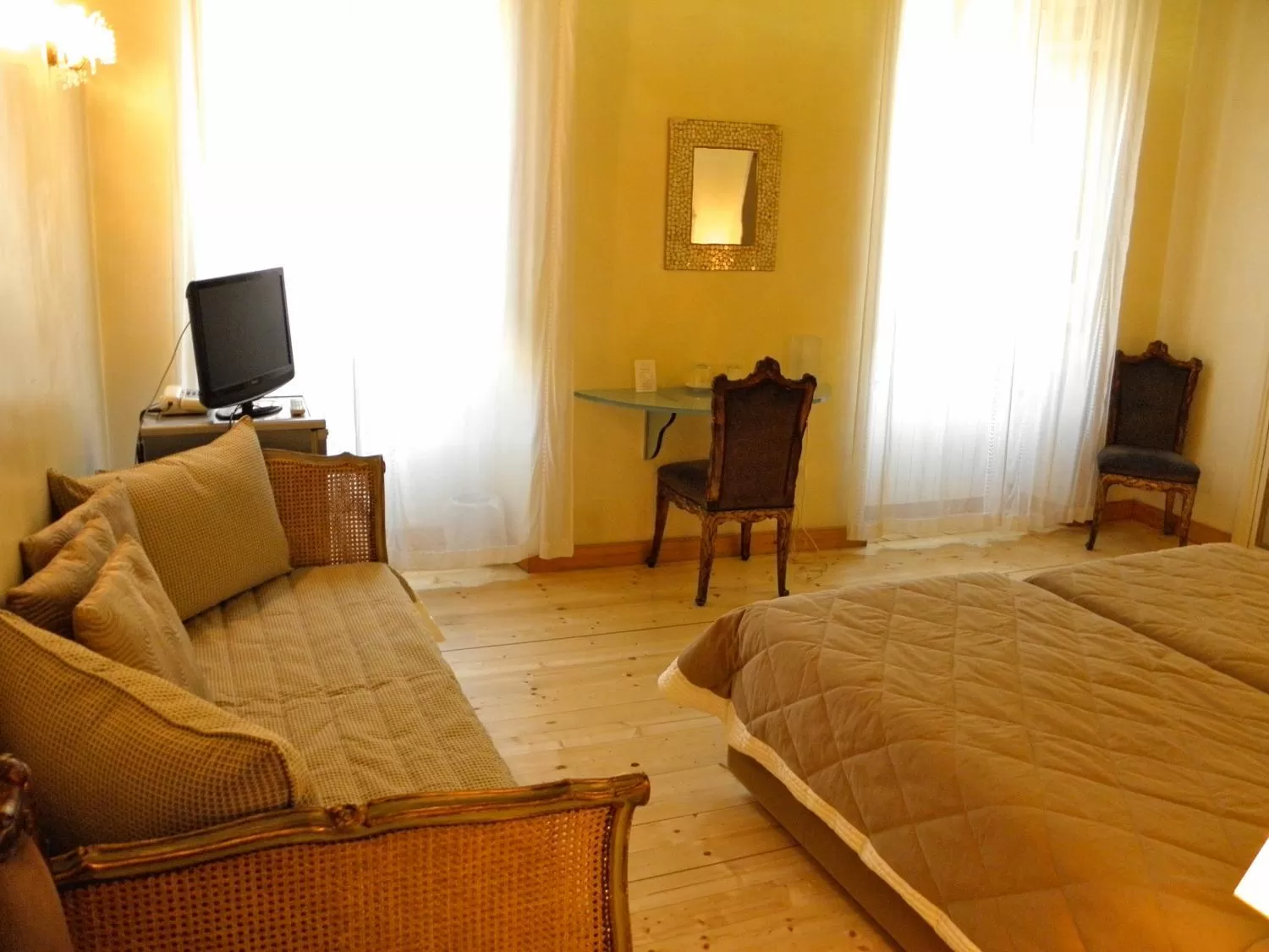 Seating area, Bed in Residenza Al Corso Suites