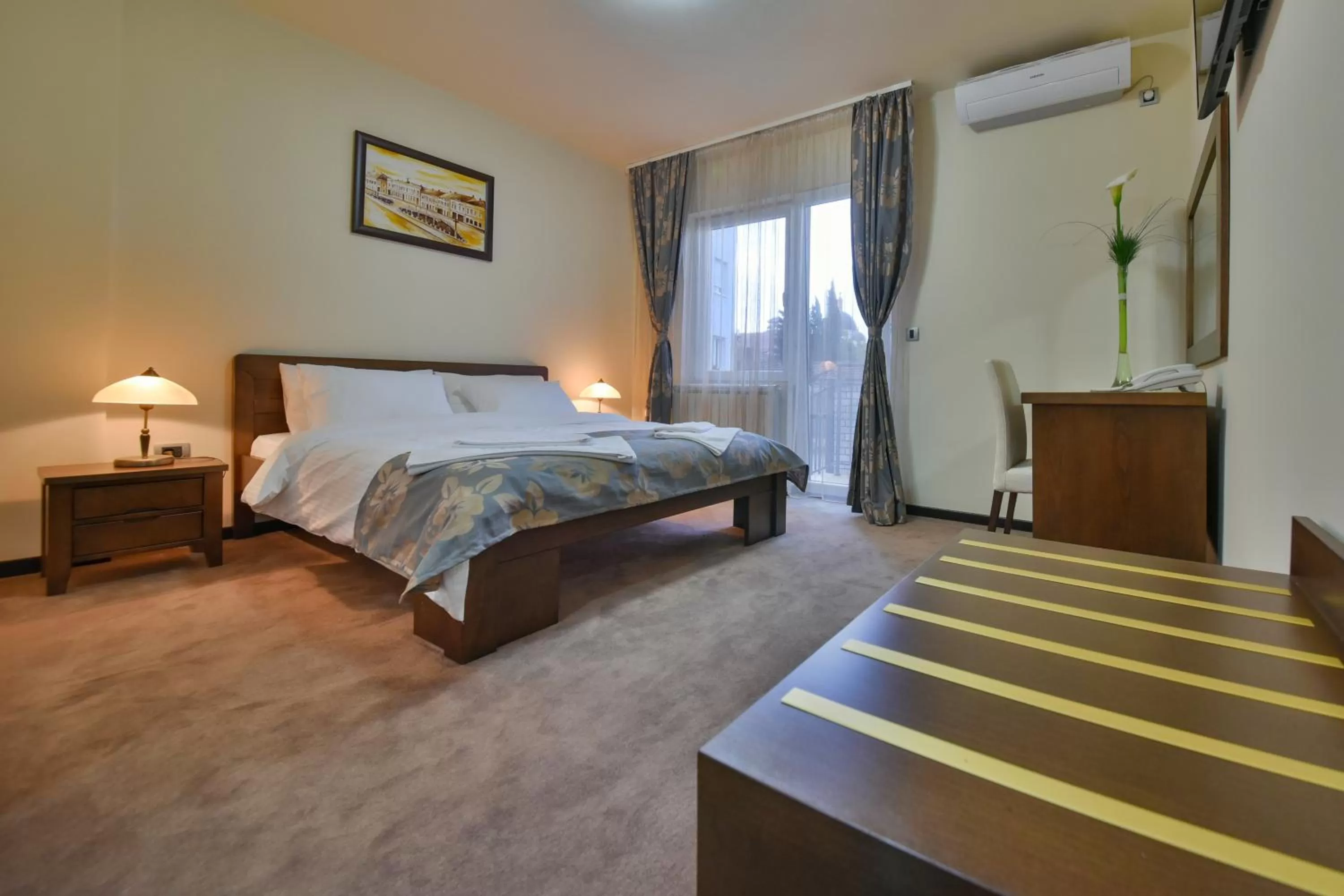 Bedroom in Garni Hotel Central Lux