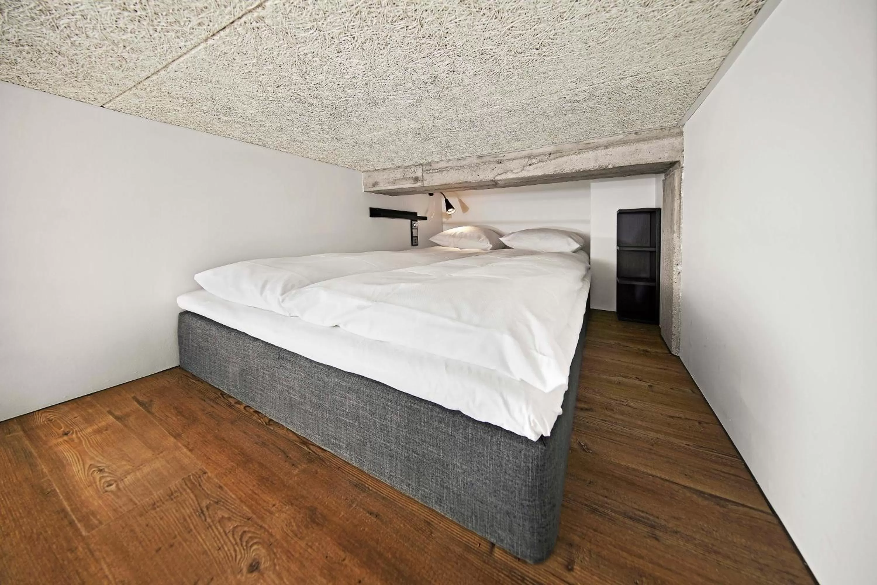 Bed in Living Suites