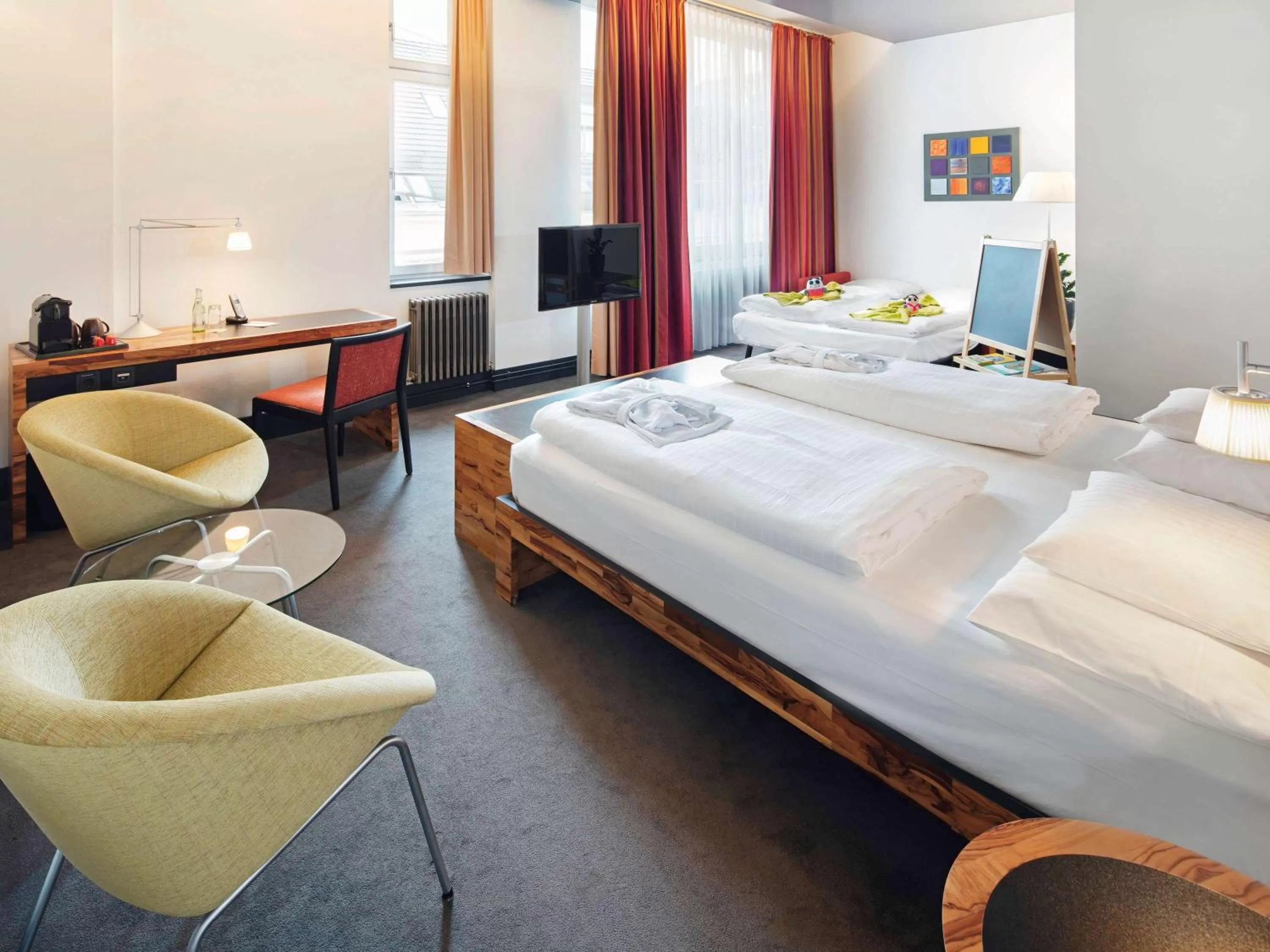 Photo of the whole room, Bed in Mövenpick Hotel Berlin Am Potsdamer Platz