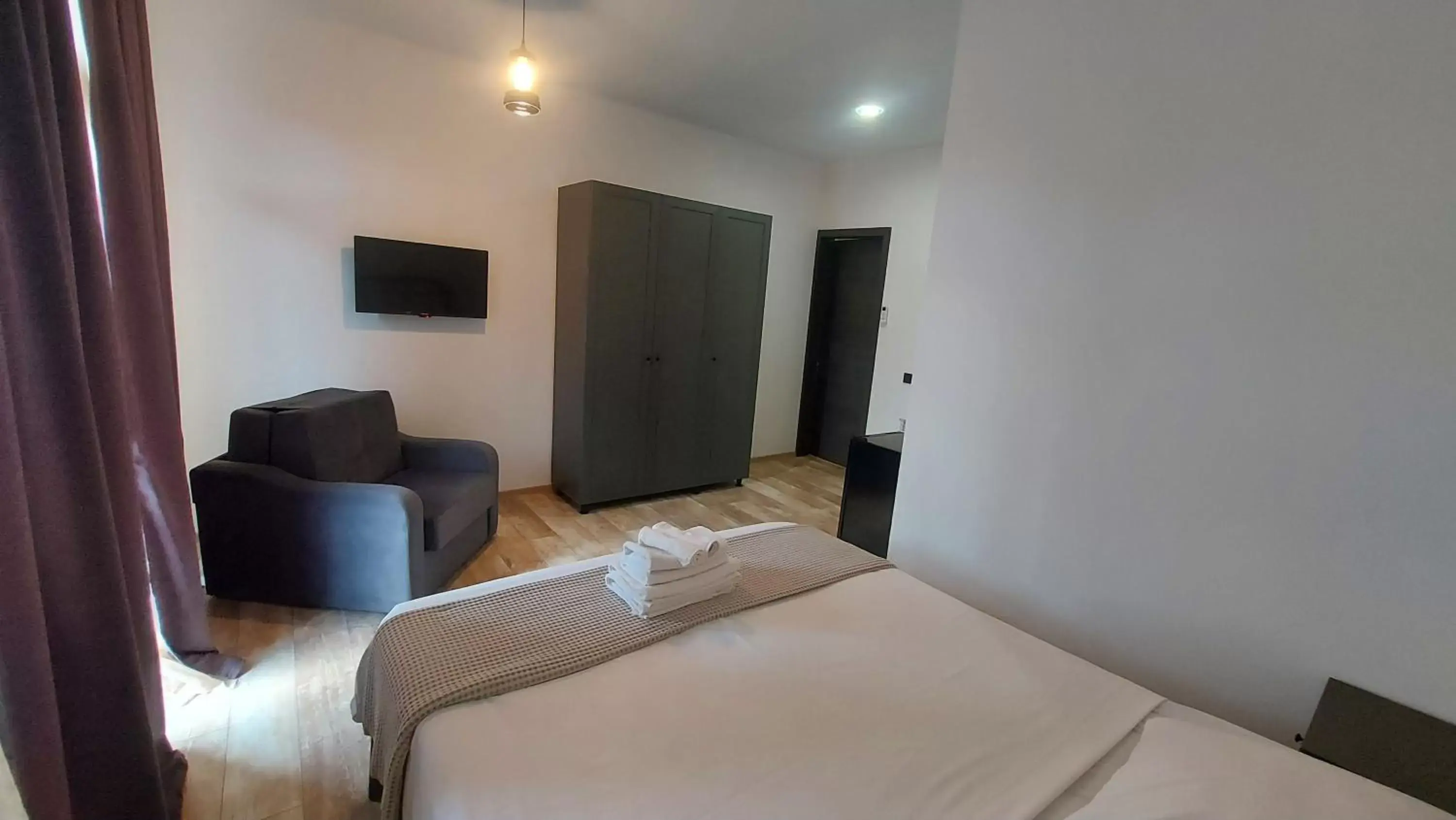 Triple Room with Bathroom in Level Up Hotel & Restaurant Triple Room with Bathroom in Level Up Hotel & Restaurant