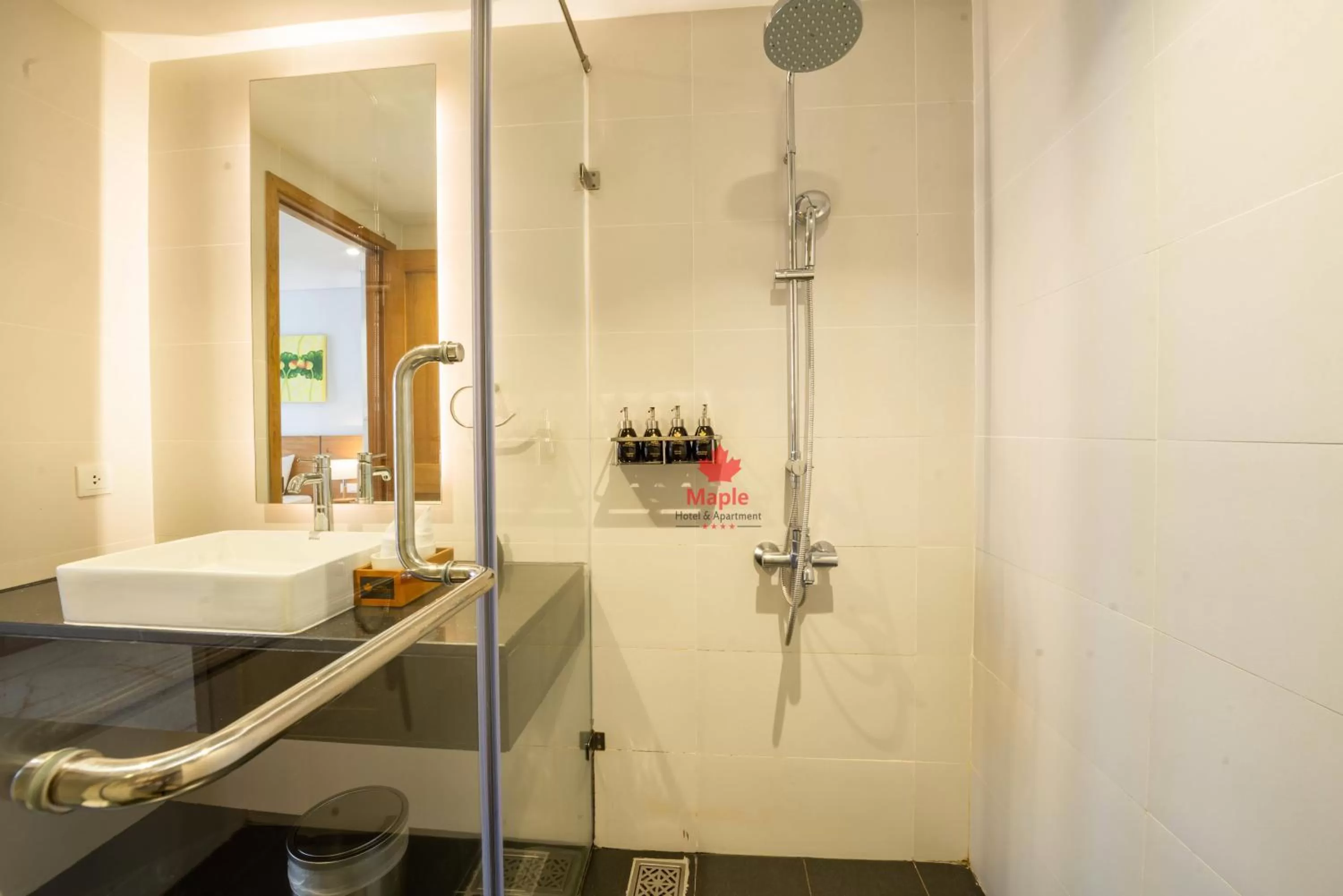 Shower in Maple Hotel & Apartment