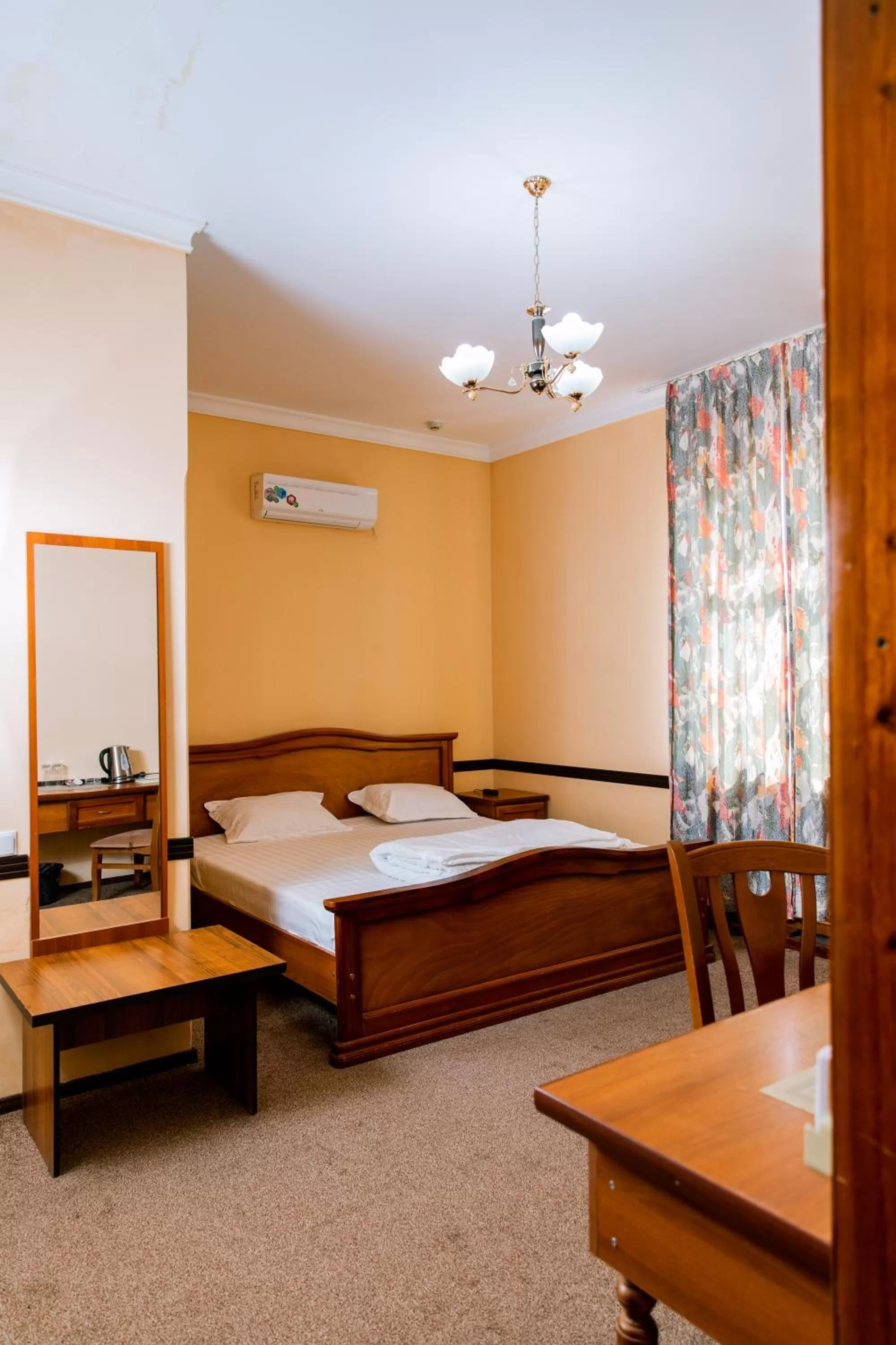 Photo of the whole room, Bed in Stella Hotel Tashkent