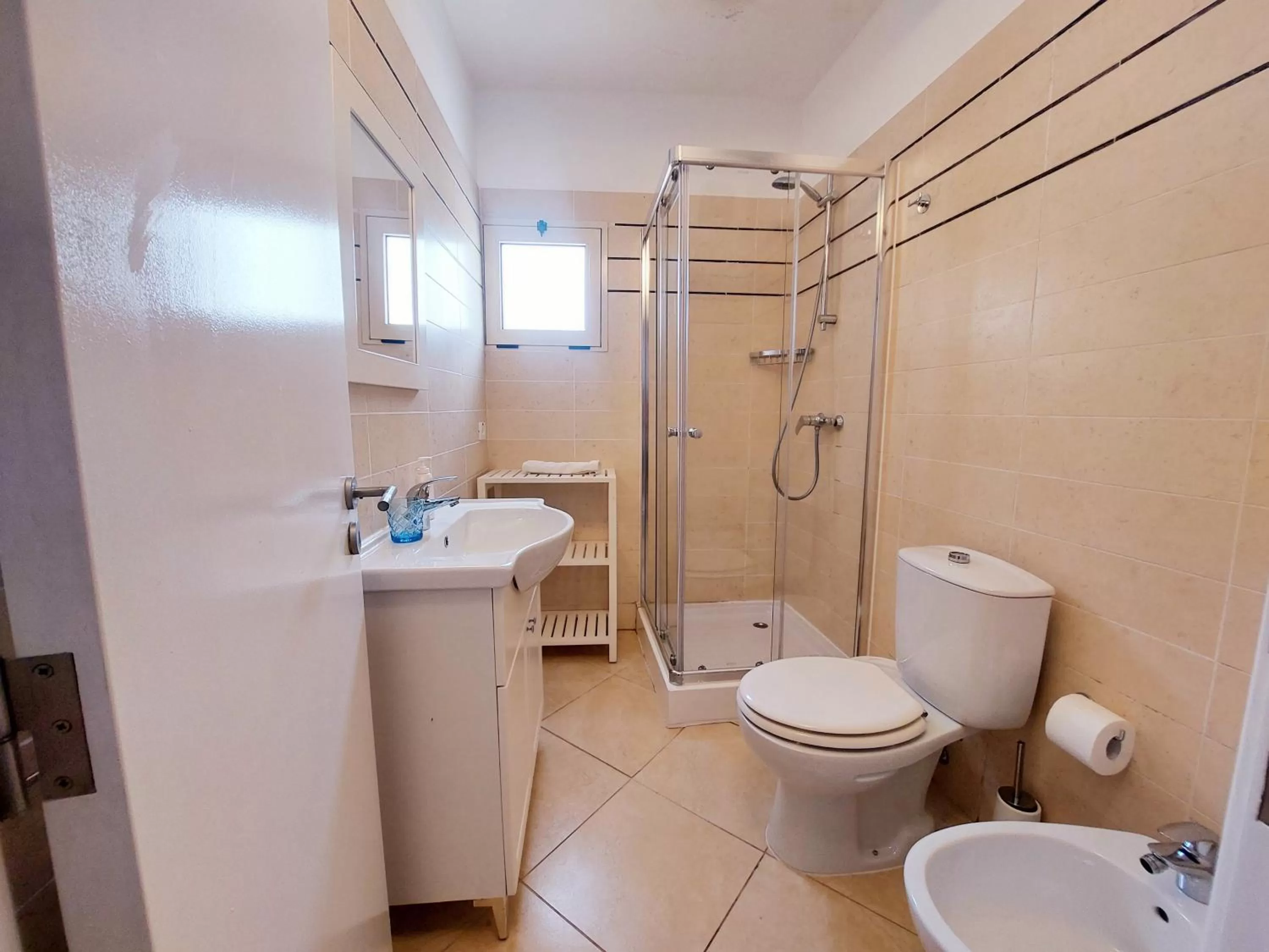 Shower in Branco Suites - Rooms & Holiday Apartments