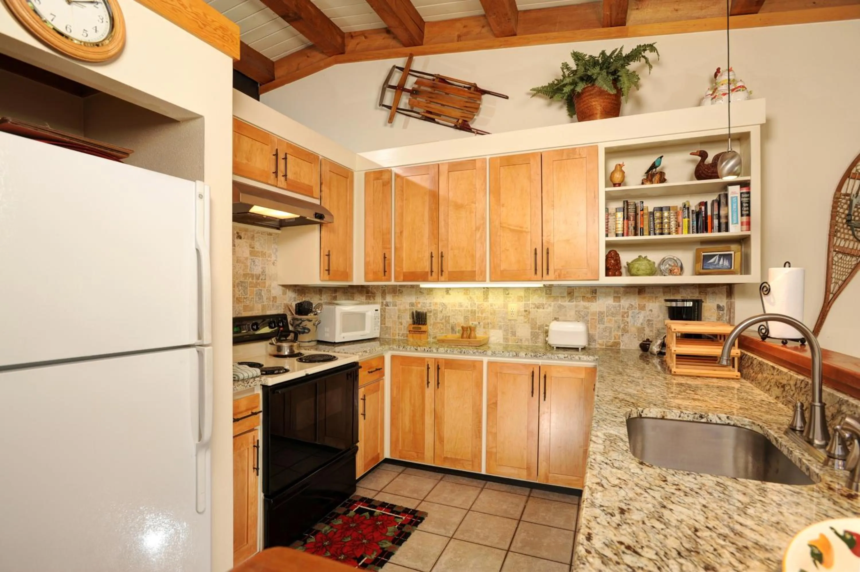 Kitchen or kitchenette in Evergreen Condominiums by Vail Resorts