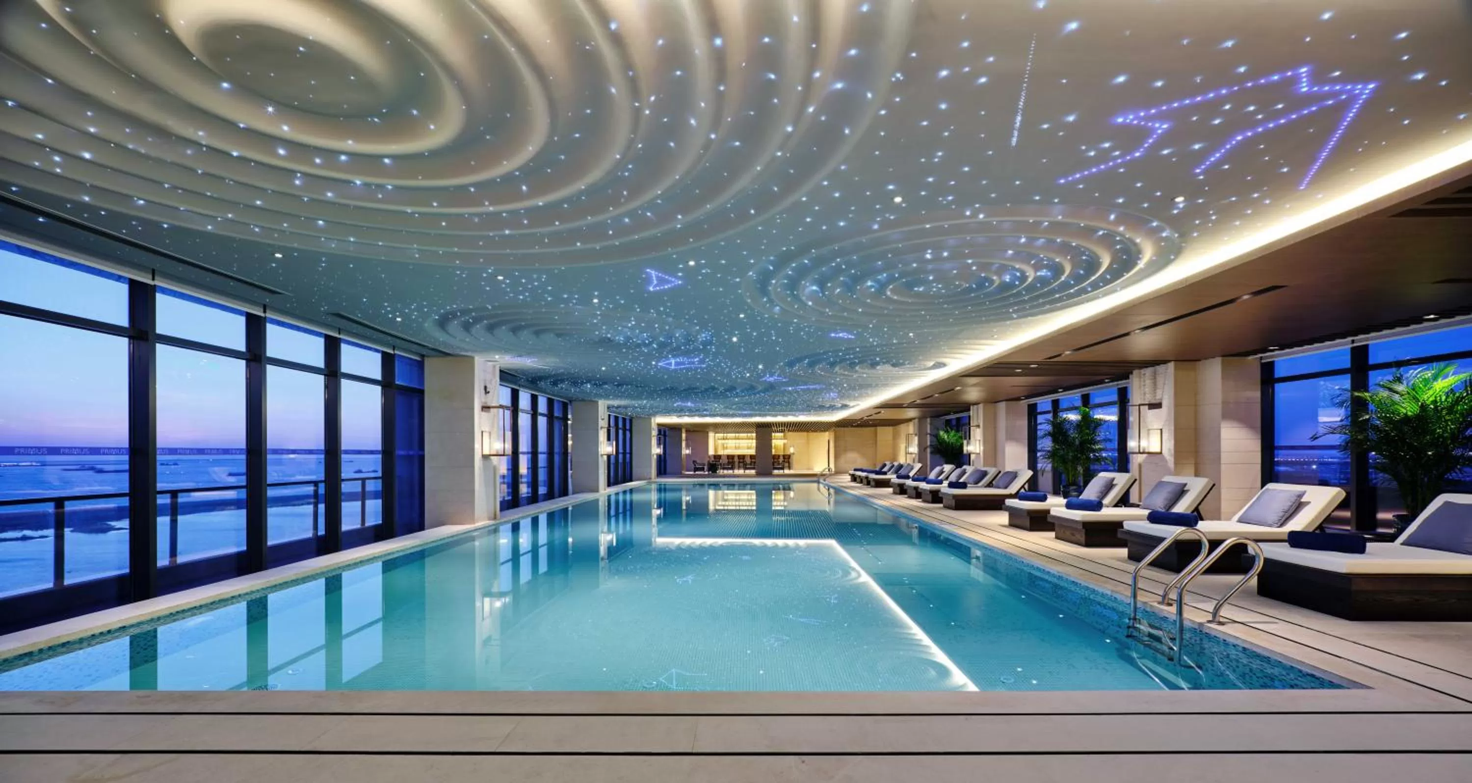 Swimming pool in Primus Hotel Shanghai Sanjiagang - Offer Pudong International Airport and Disney shuttle