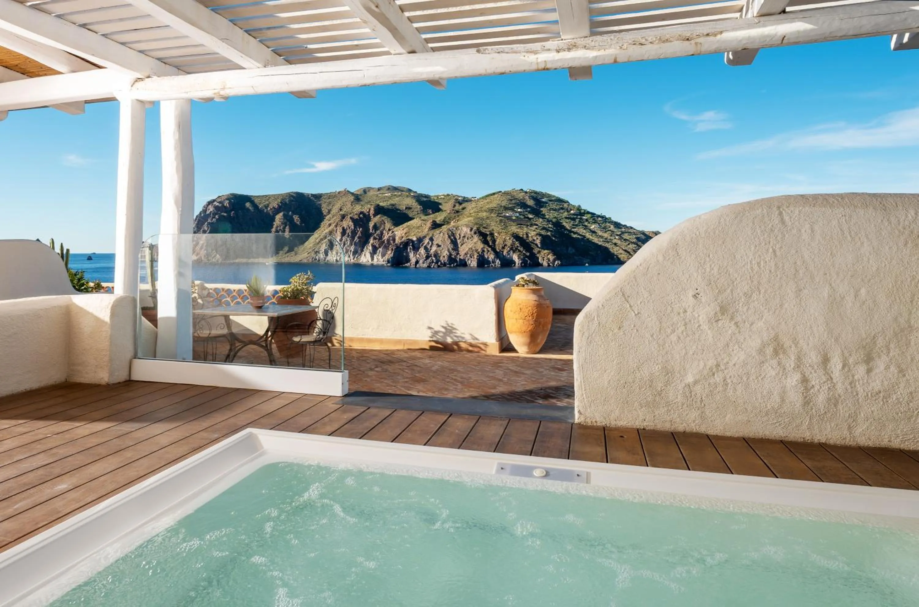 Patio in Therasia Resort Sea and SPA - The Leading Hotels of the World