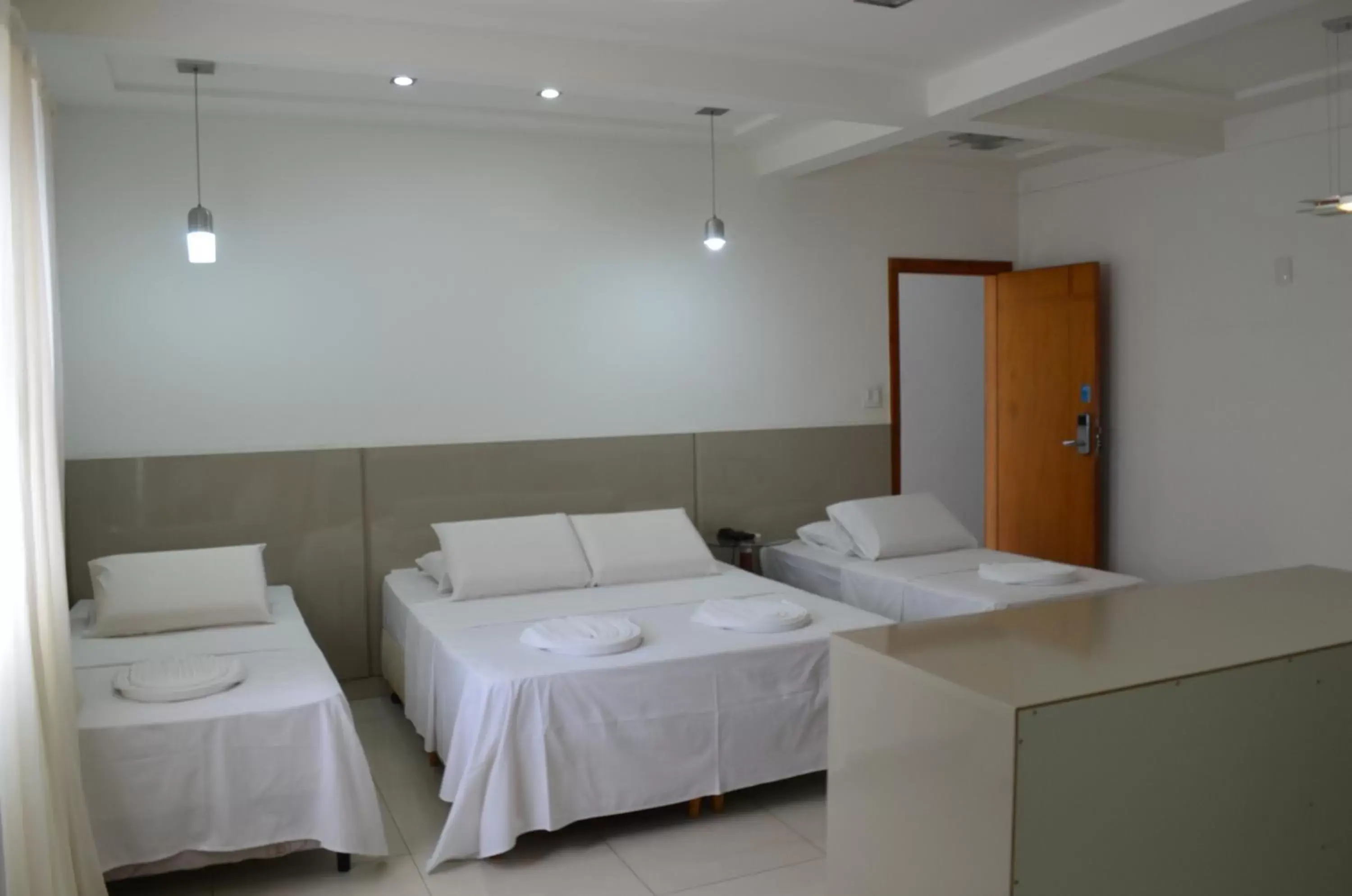 Deluxe Quadruple Room in Hotel Universo Deluxe Quadruple Room in Hotel Universo