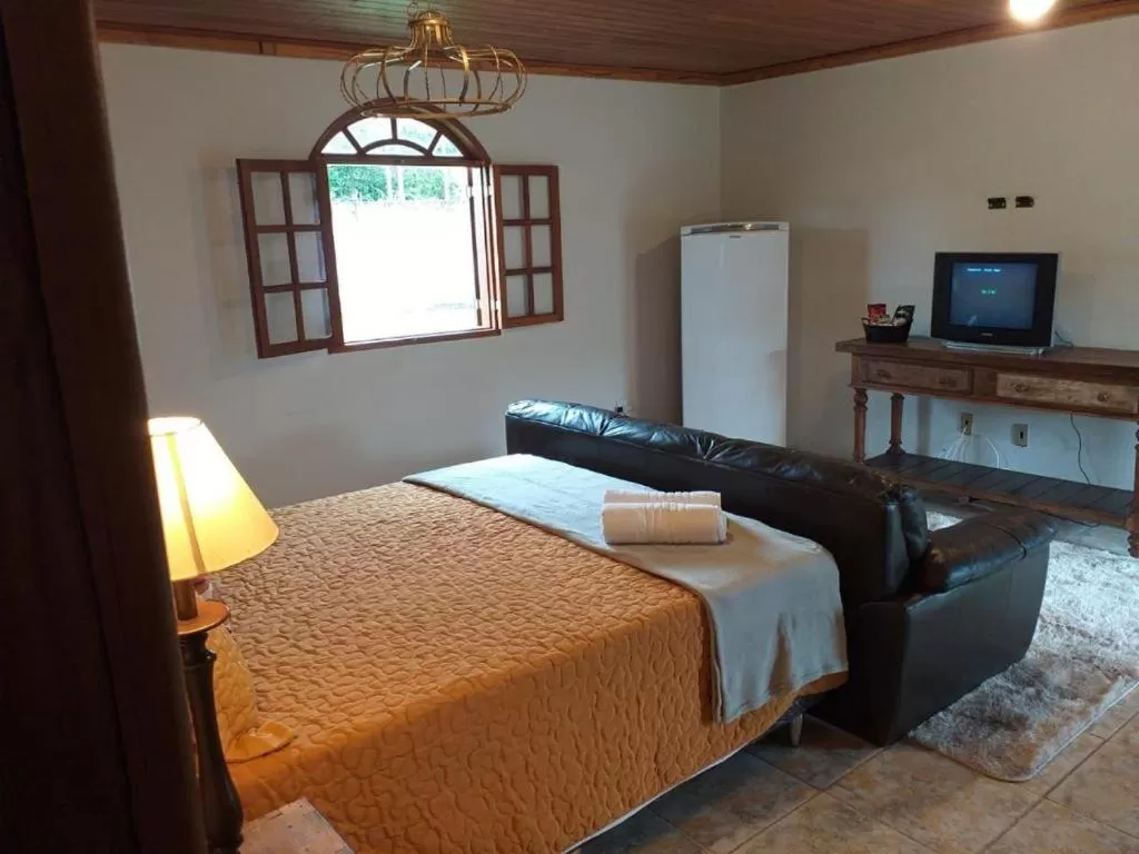 Bed in POUSADA CHARLOTTE