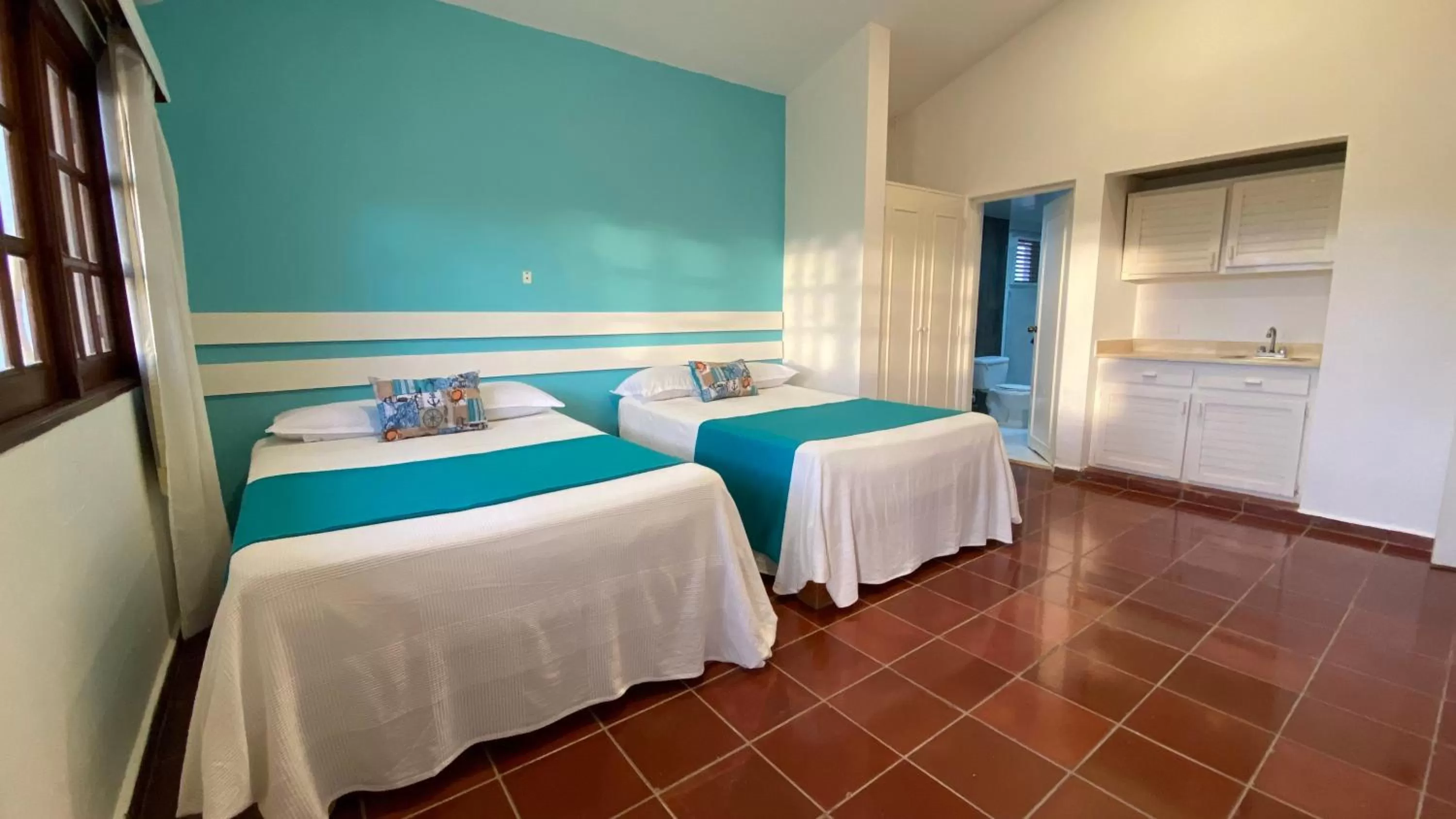 Bed in Calypso Beach Hotel by The Urbn House Santo Domingo Airport