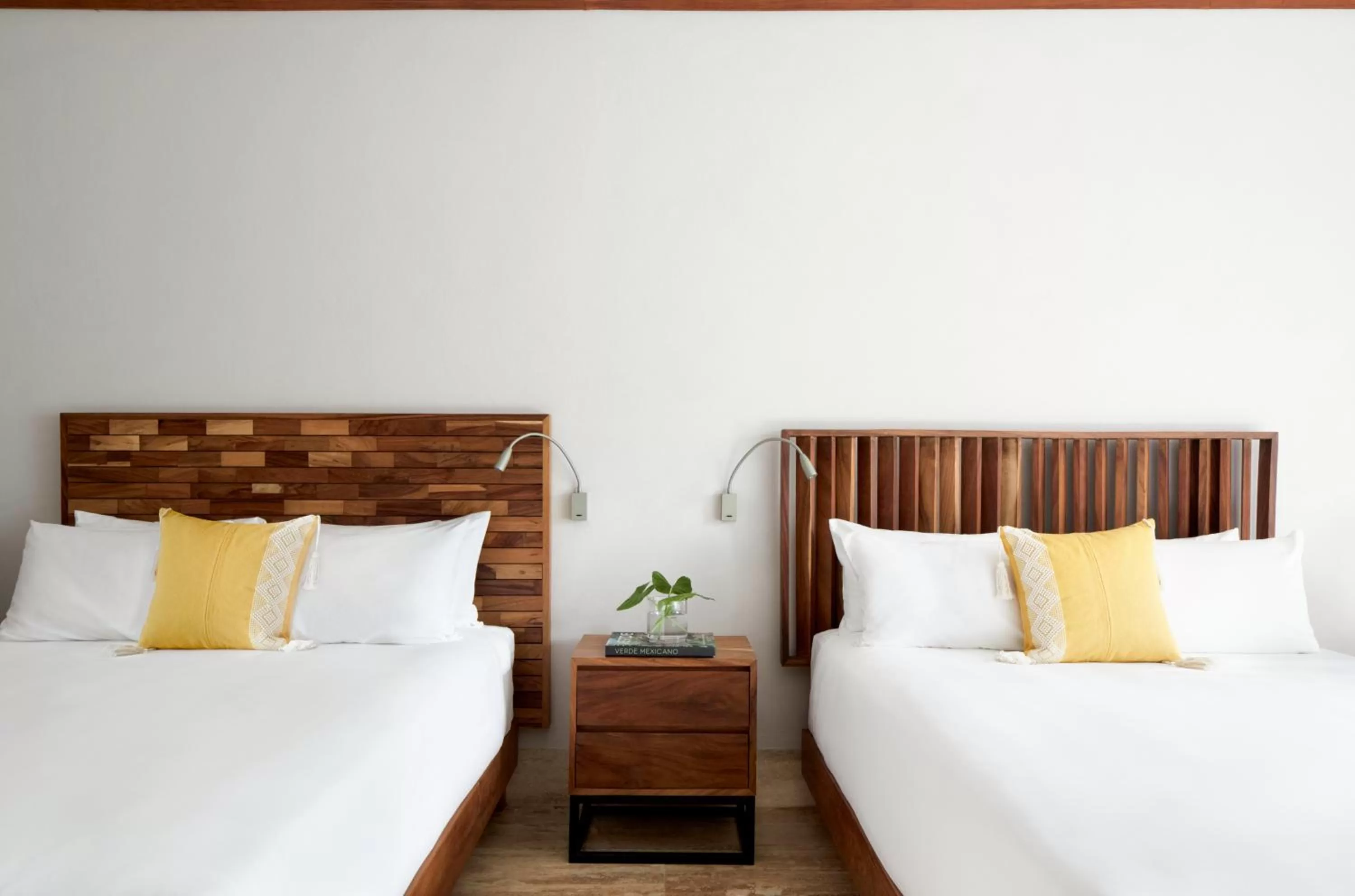 Bed in Kimpton Aluna Resort Tulum by IHG