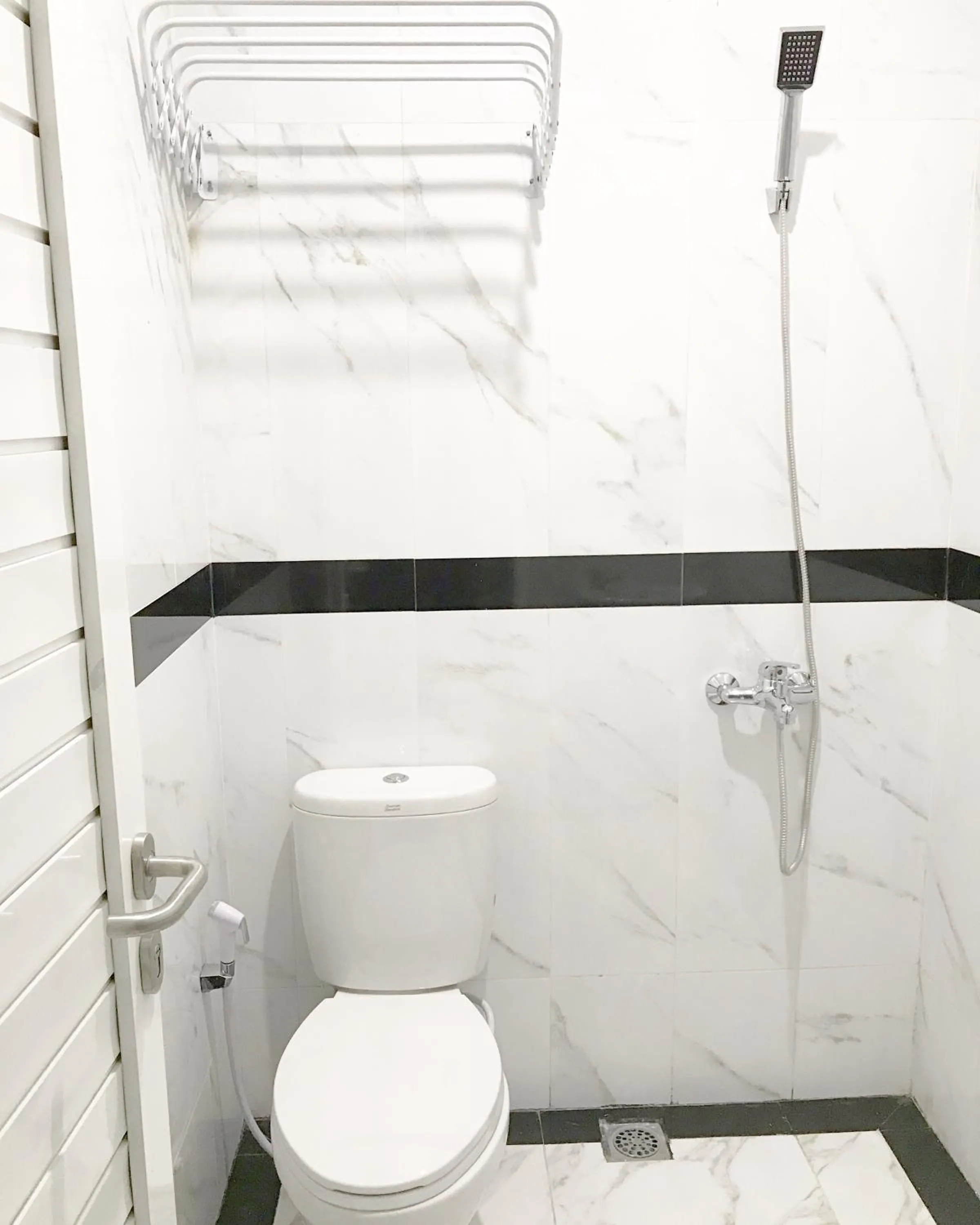 Bathroom in RedDoorz Plus near Politeknik Negeri Malang