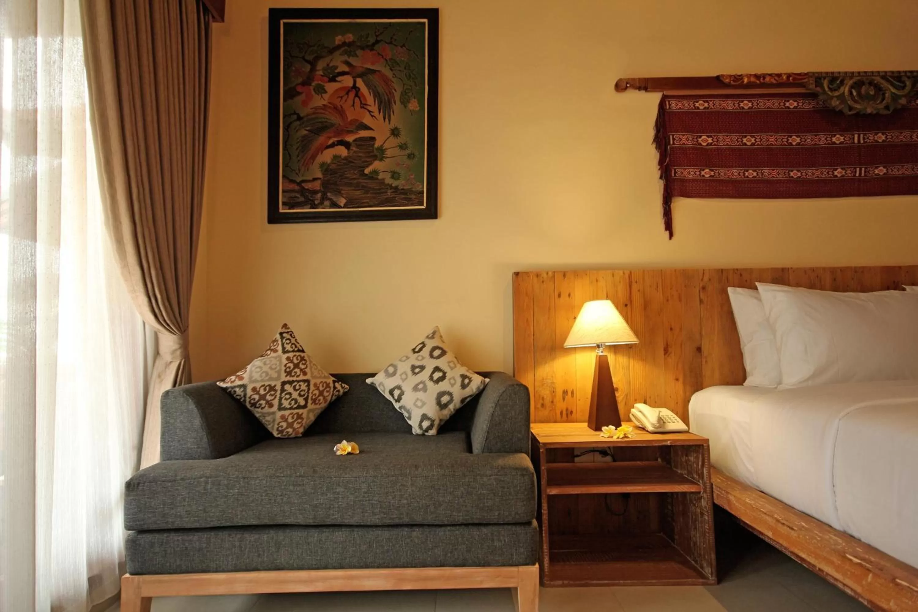Living room, Bed in Mina Pelasa Hotel