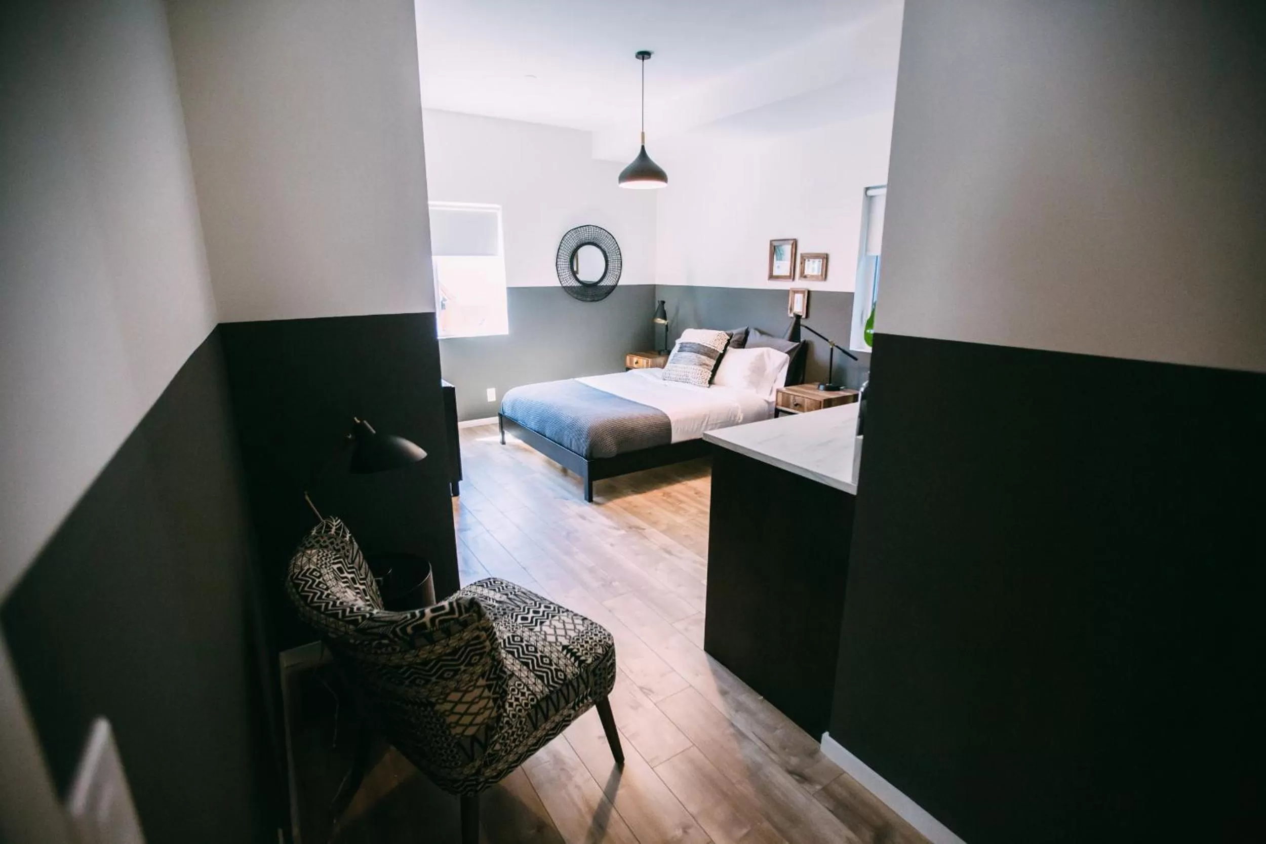 Photo of the whole room, Bed in Noon on Sunset Hill