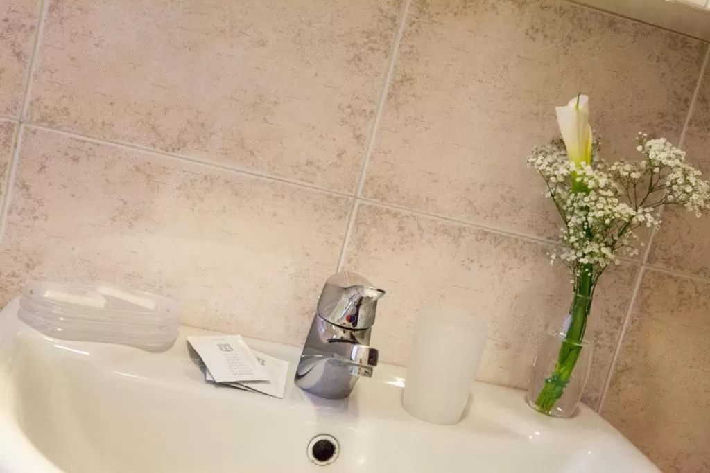 Bathroom in Giada Palace - Rooms