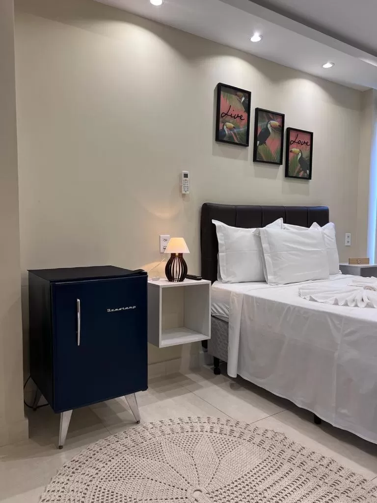 Bed in Pousada Arraial Tropical