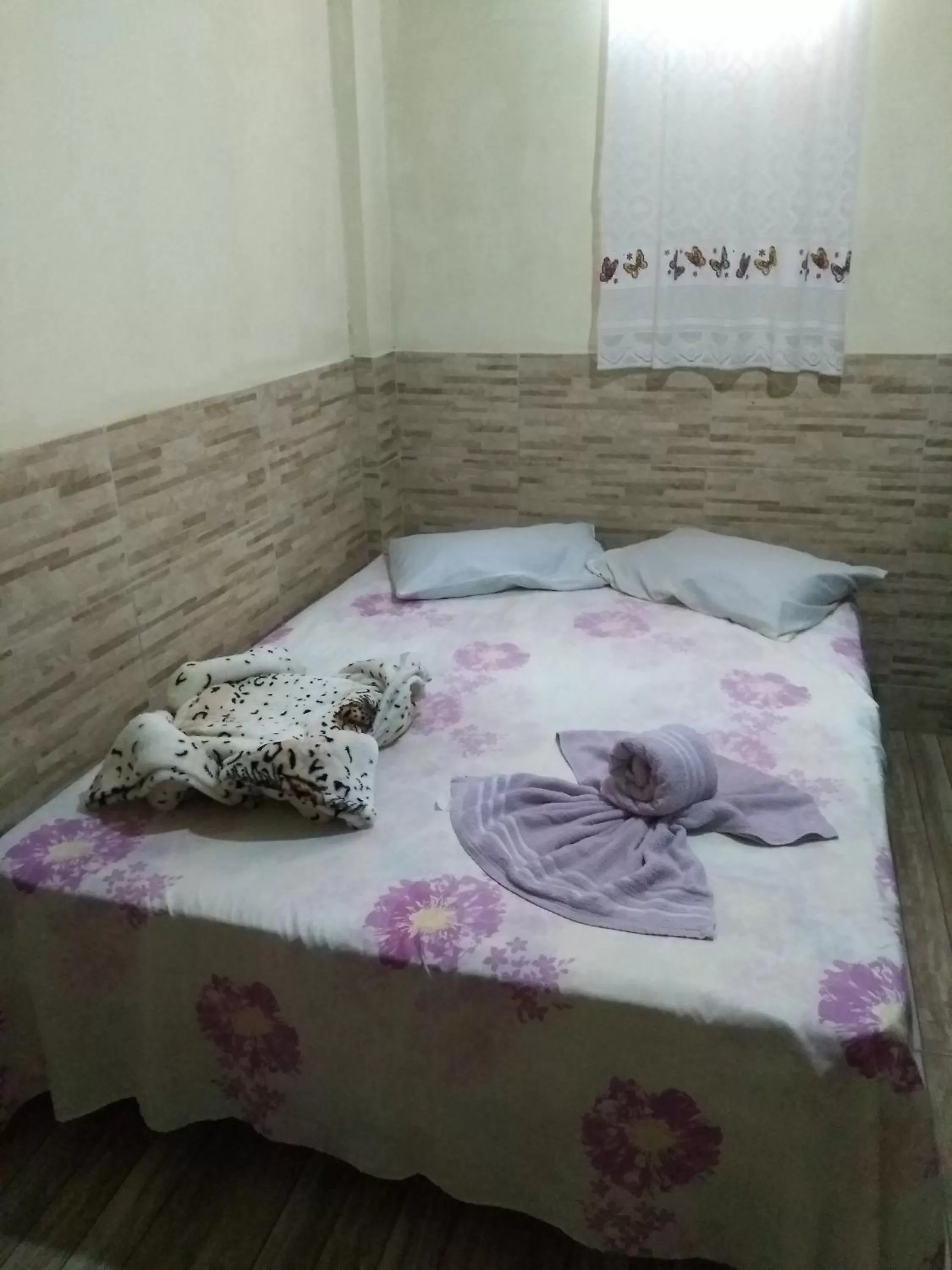 Property building, Bed in Pousada Encanto e Magia