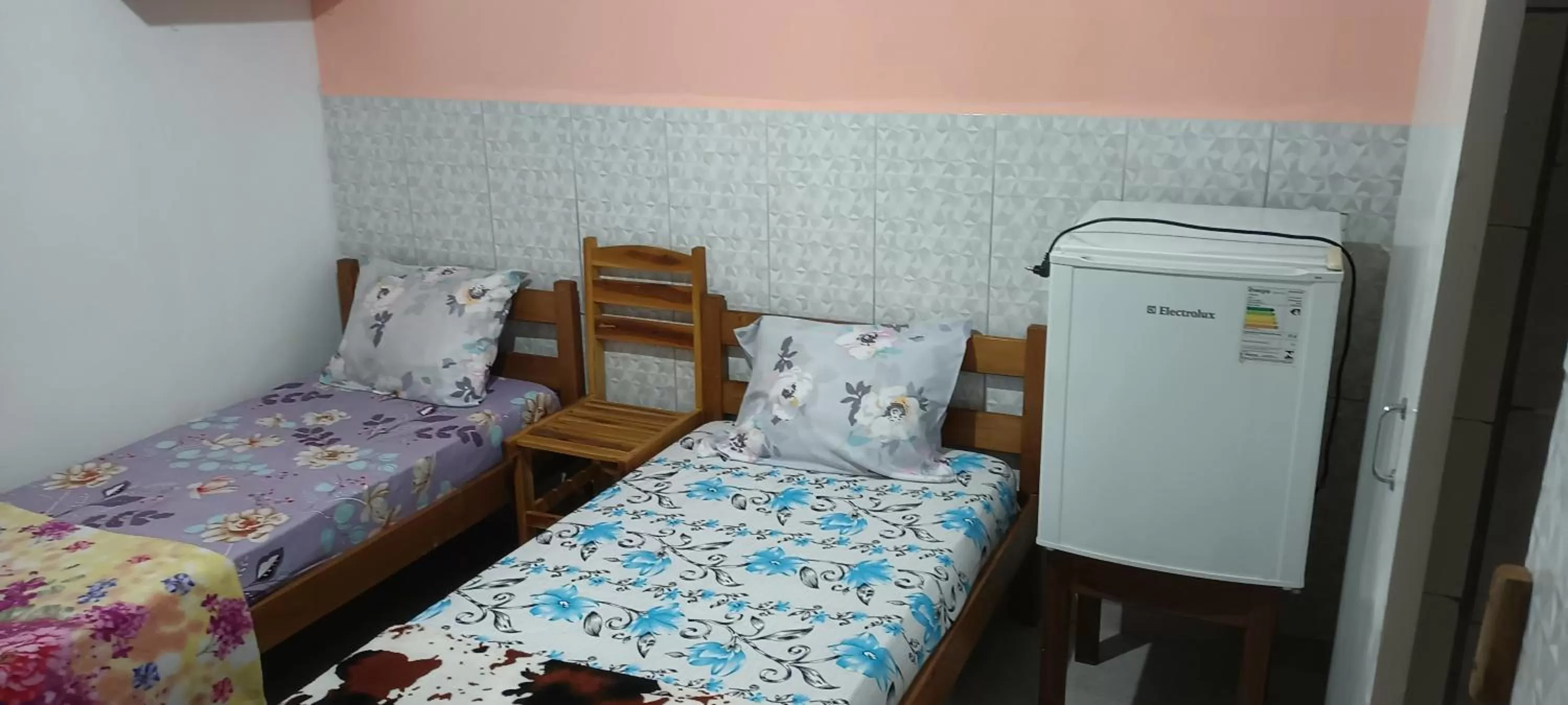 Bed in Pousada dos Ventos