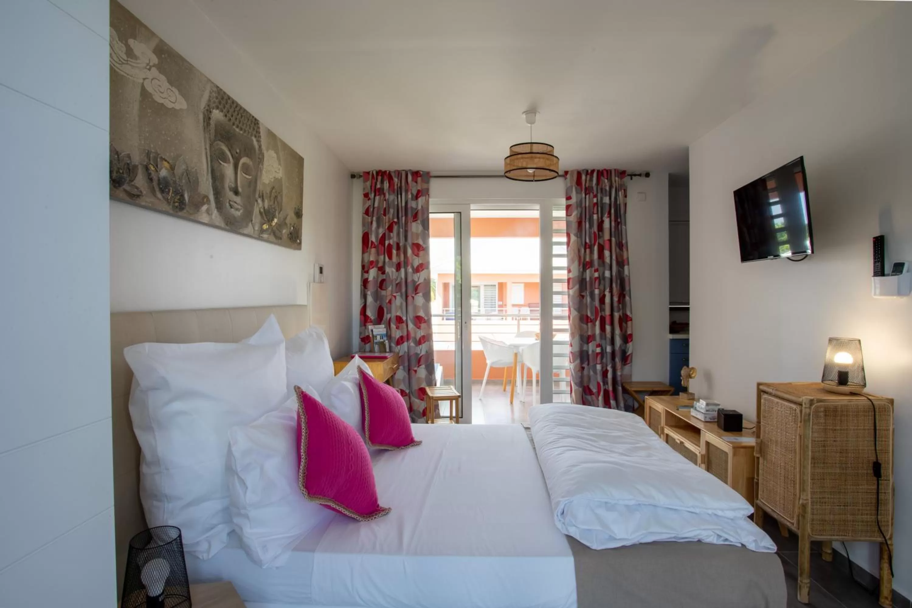 Bed in Hôtel Guadeloupe Palm Suites