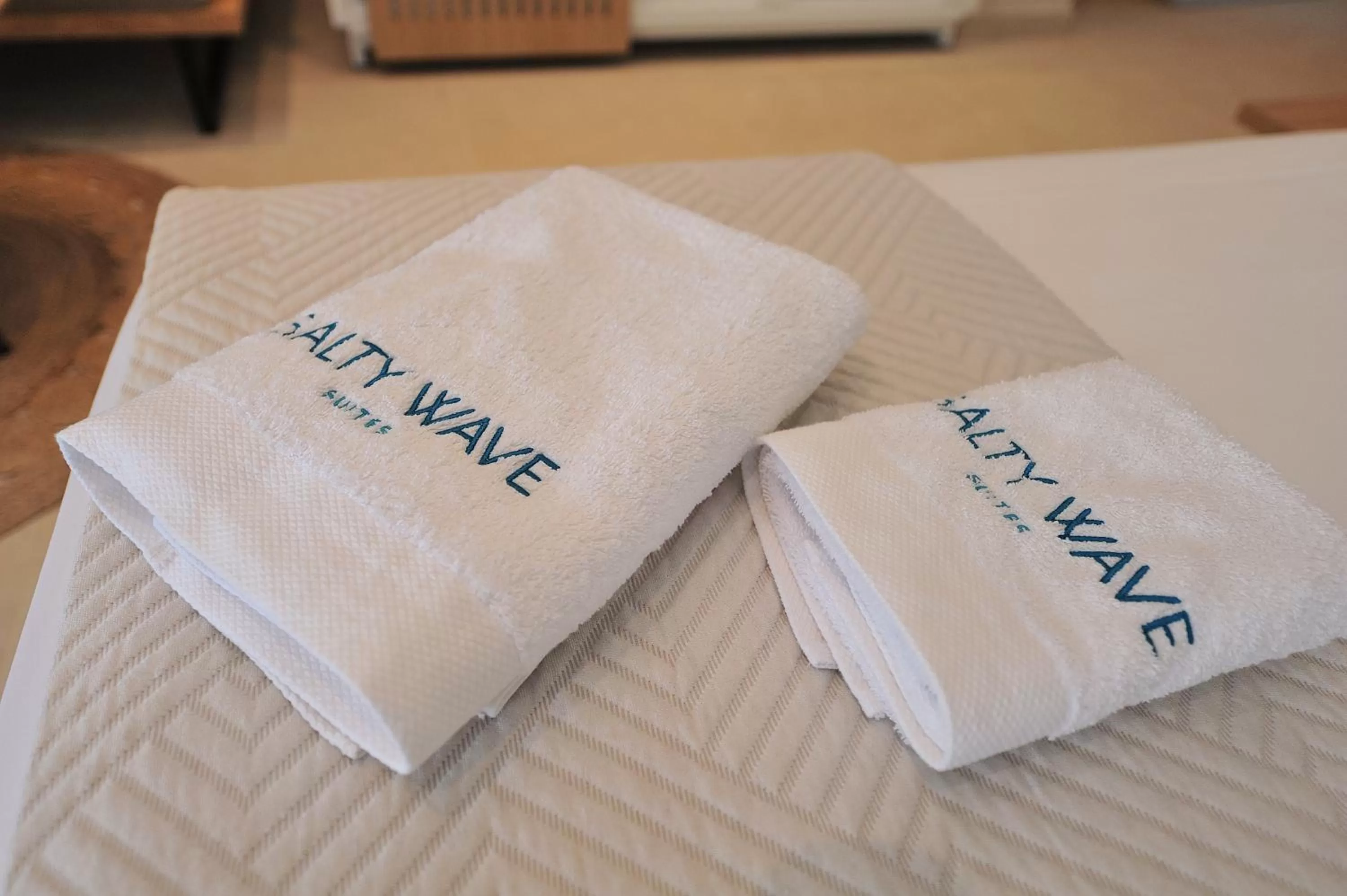 Property Logo/Sign in Salty Wave Suites