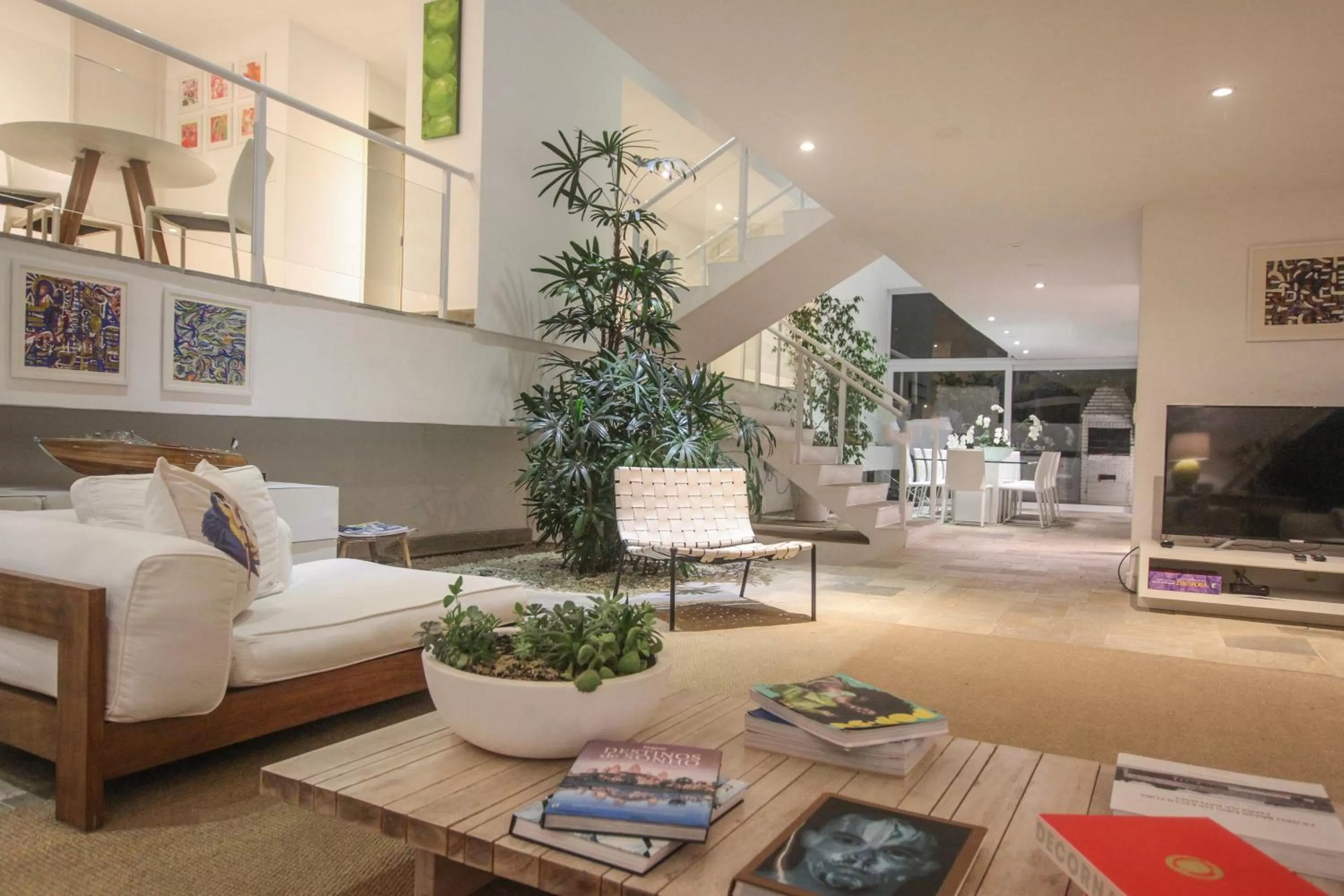 Communal lounge/ TV room in Guest House Guarujá