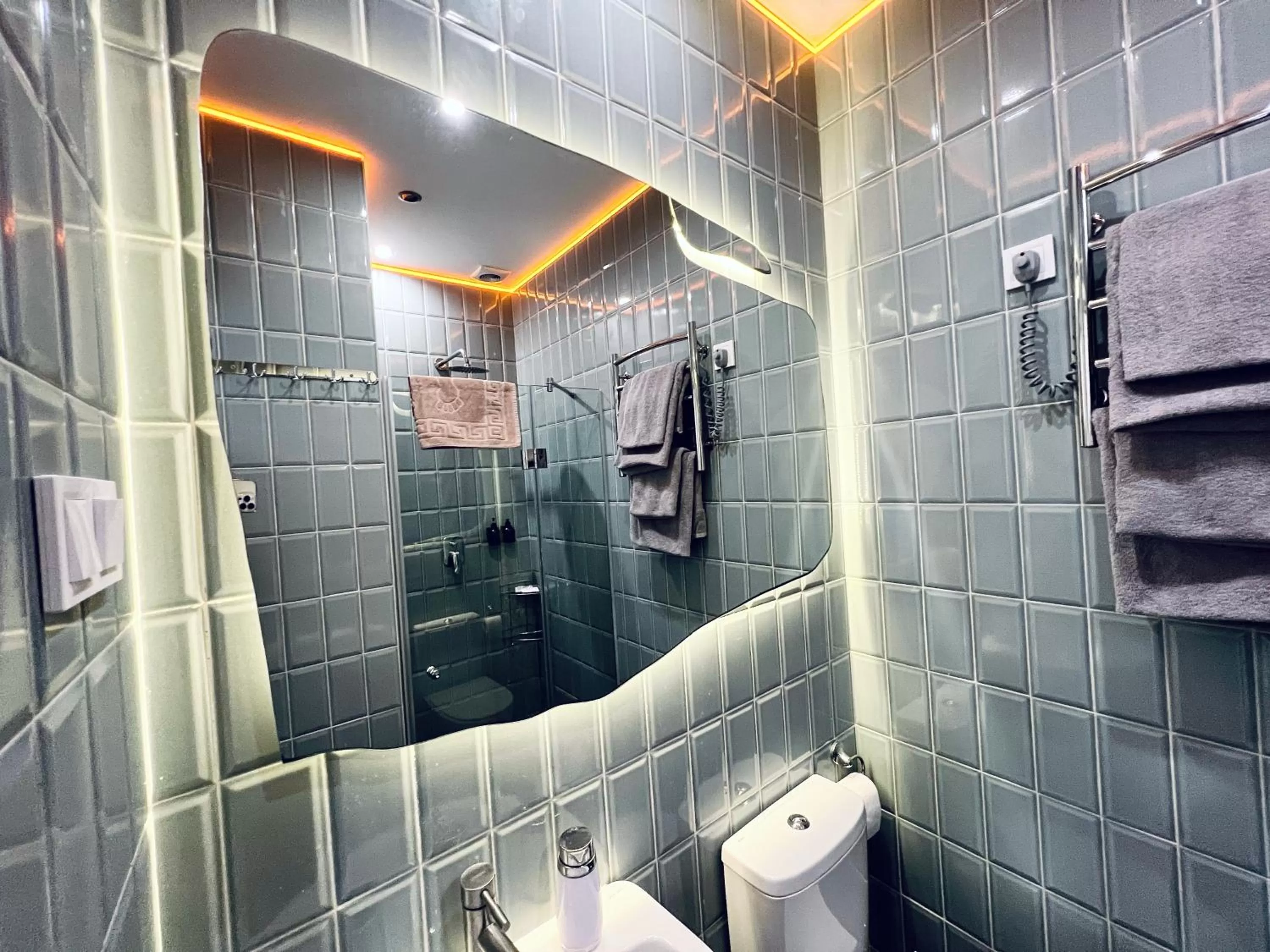 Shower, Bathroom in Kyiv Panorama Apartments near Gulliver