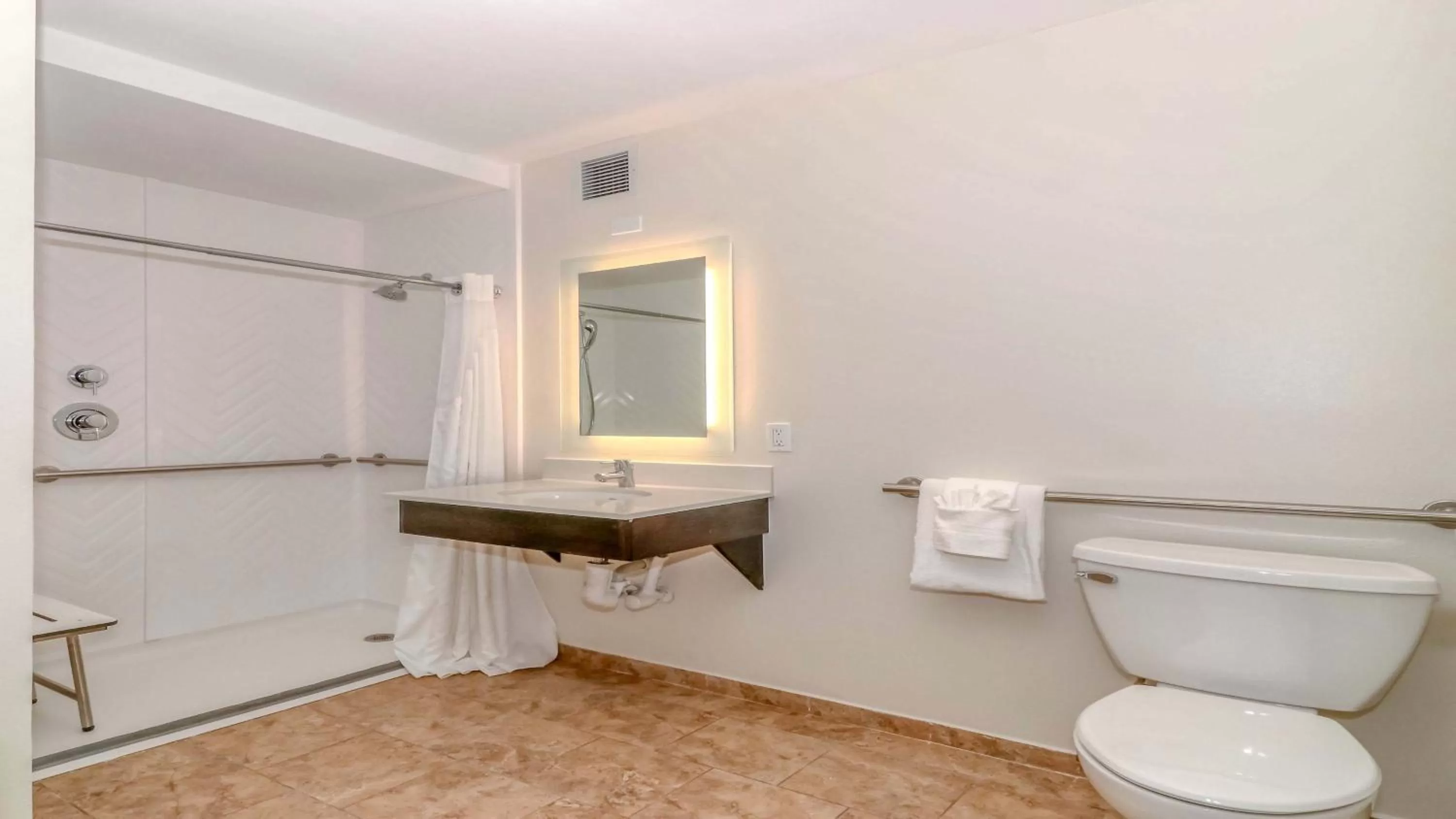 Bathroom in Holiday Inn Resort Oceanfront at Surfside Beach by IHG