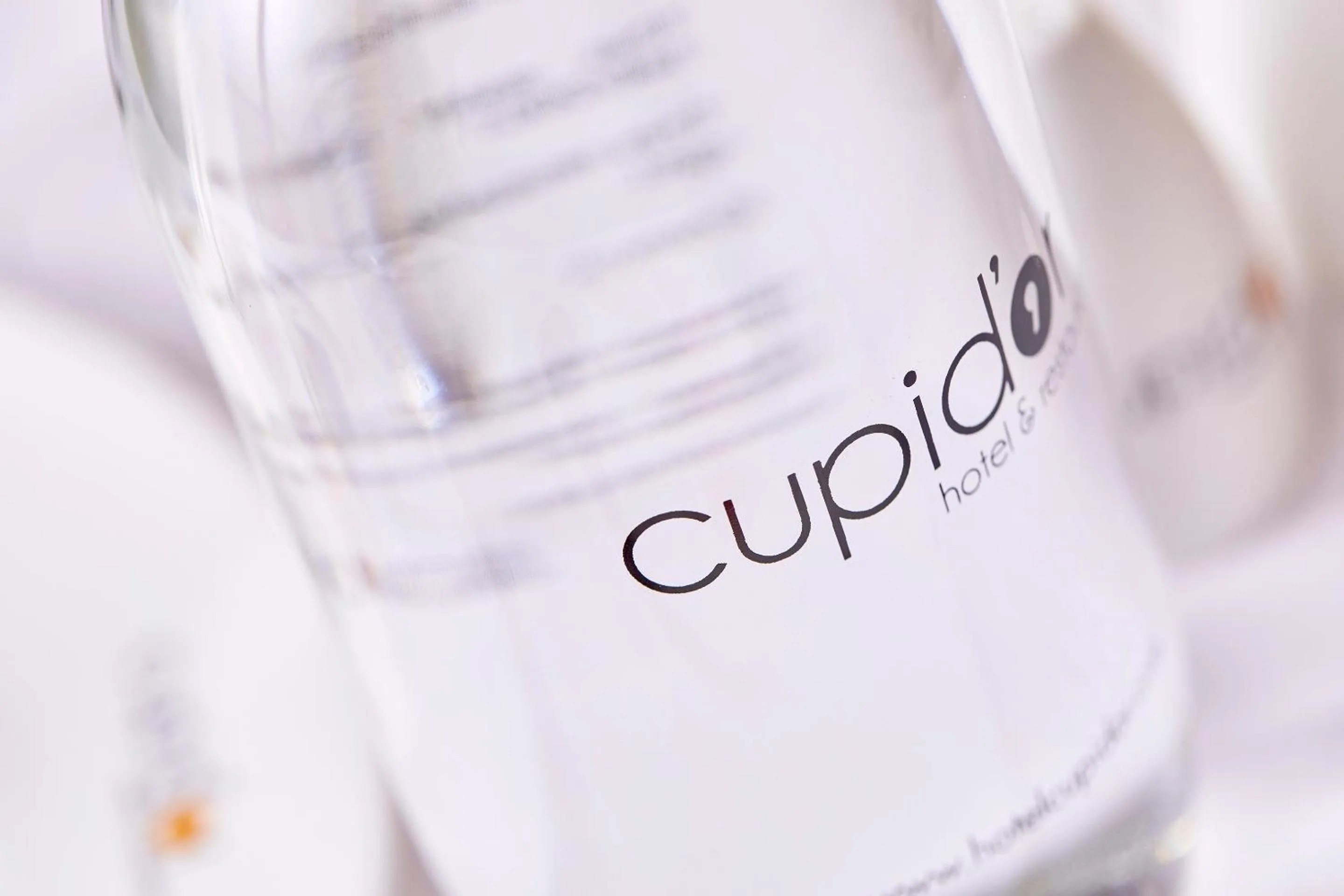 Property logo or sign in Hotel Cupidor