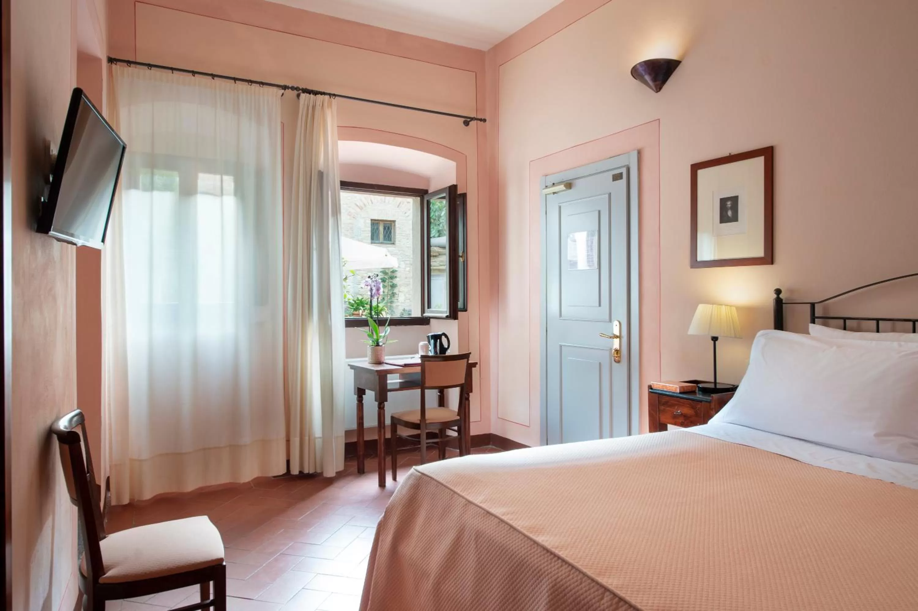 Bed in Hotel L'Antico Pozzo