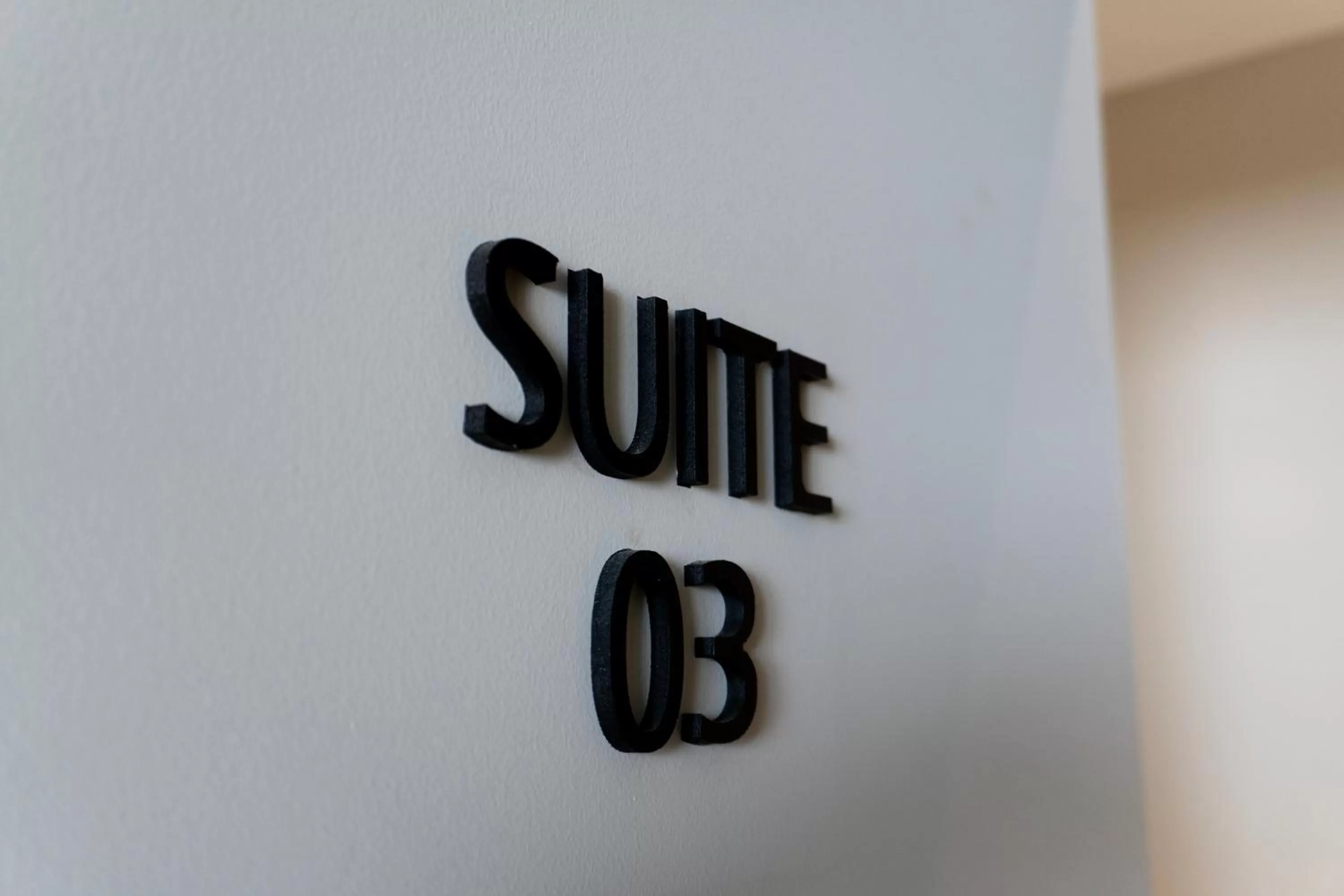 Text overlay in ZOE LUXURY SUITES