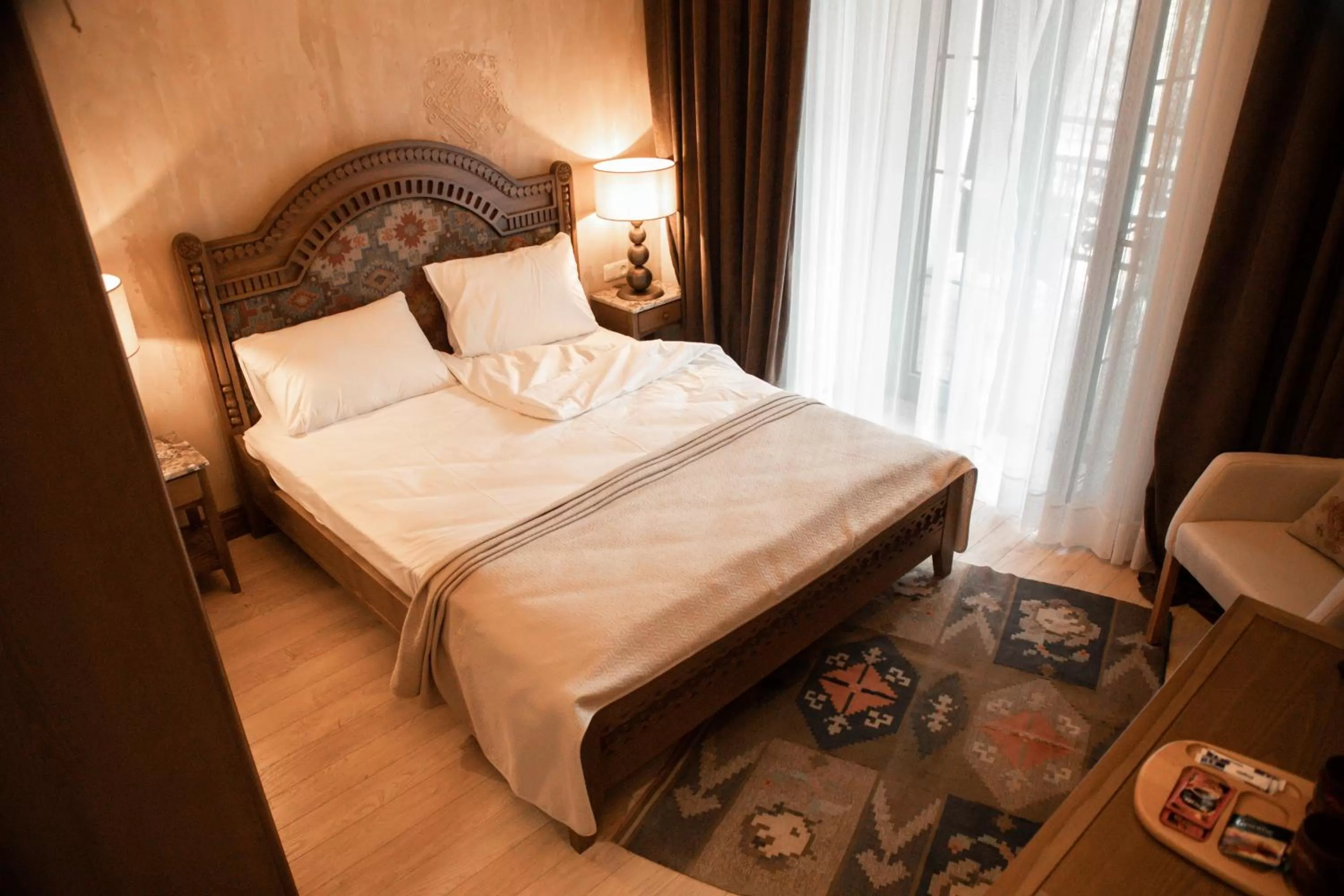 Bed in Boutique ETHNO HOTEL