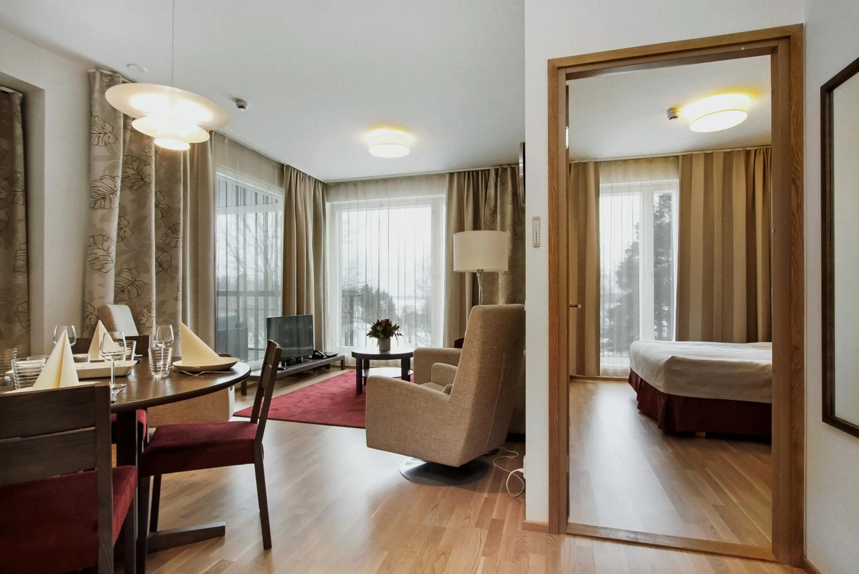 Living room, Bed in Holiday Club Saimaa Apartments