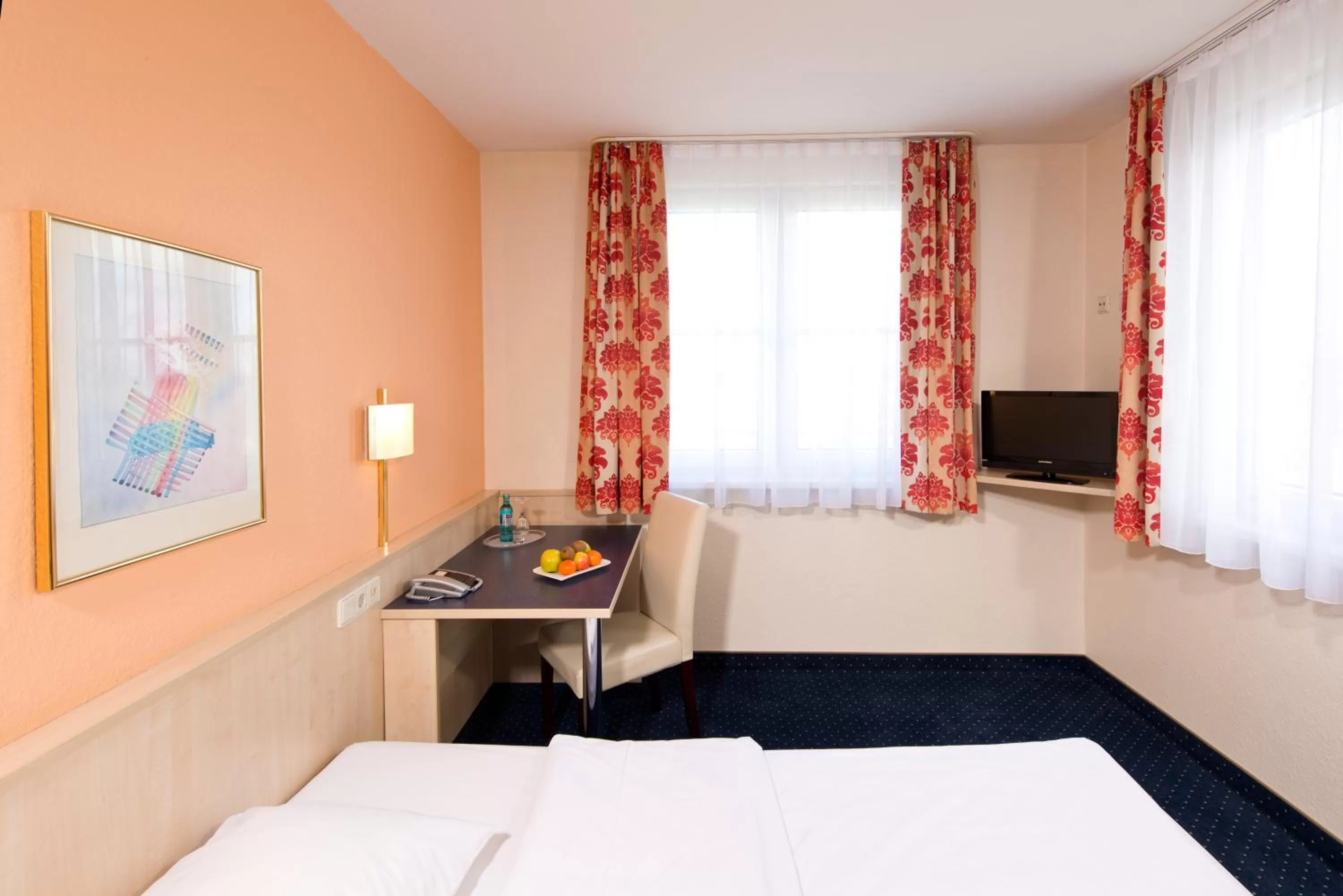 Photo of the whole room, Bed in ACHAT Hotel Leipzig Messe