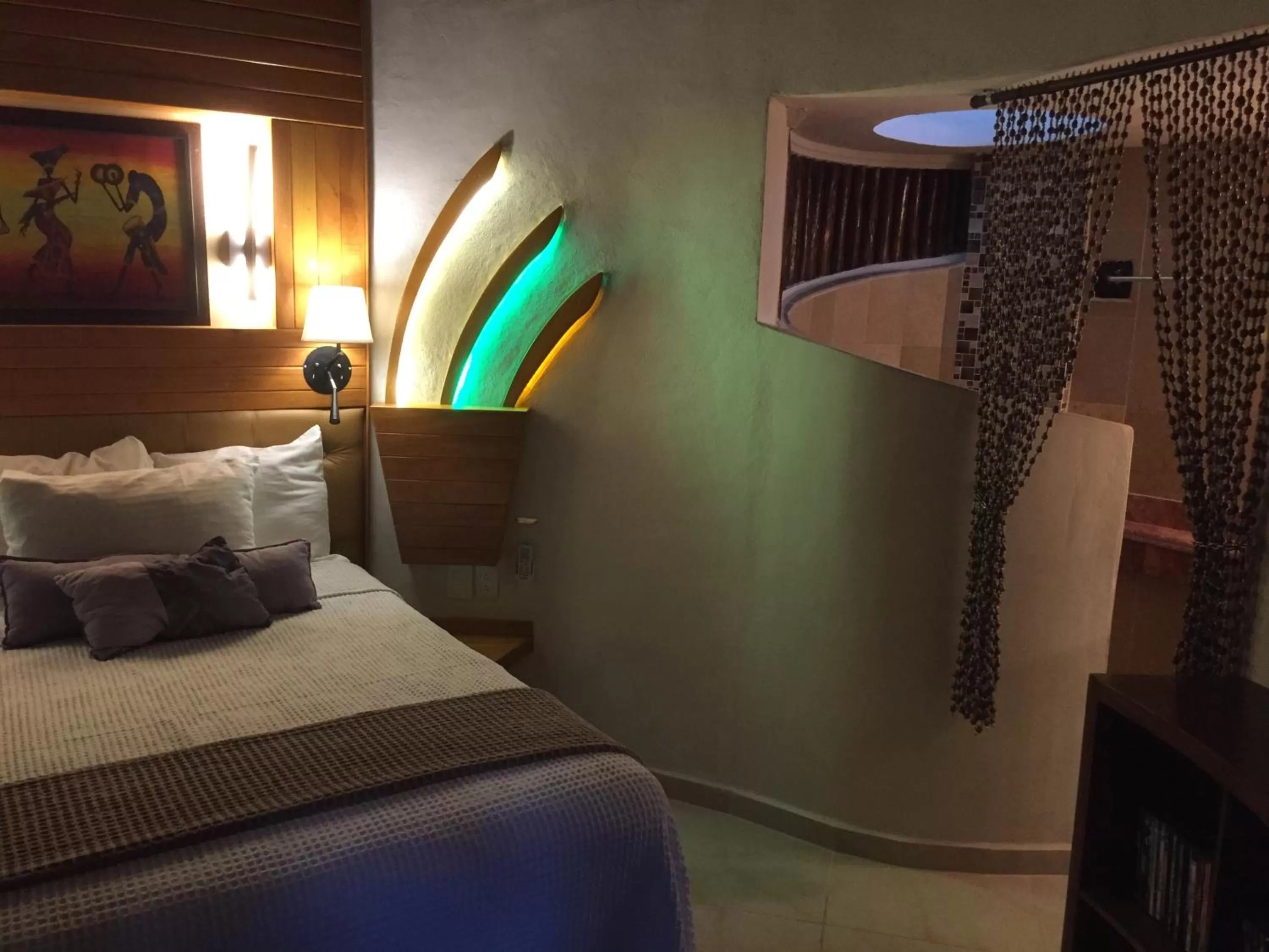 Bed in Cocos Cabañas Playa del Carmen Adults Only