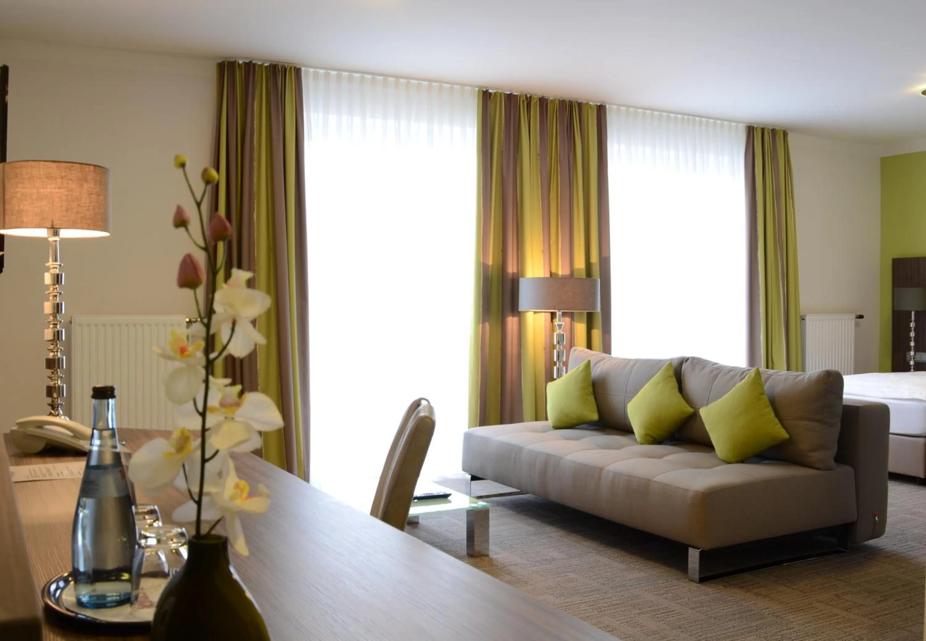 Living room, Bed in Hotel Ambiente Walldorf