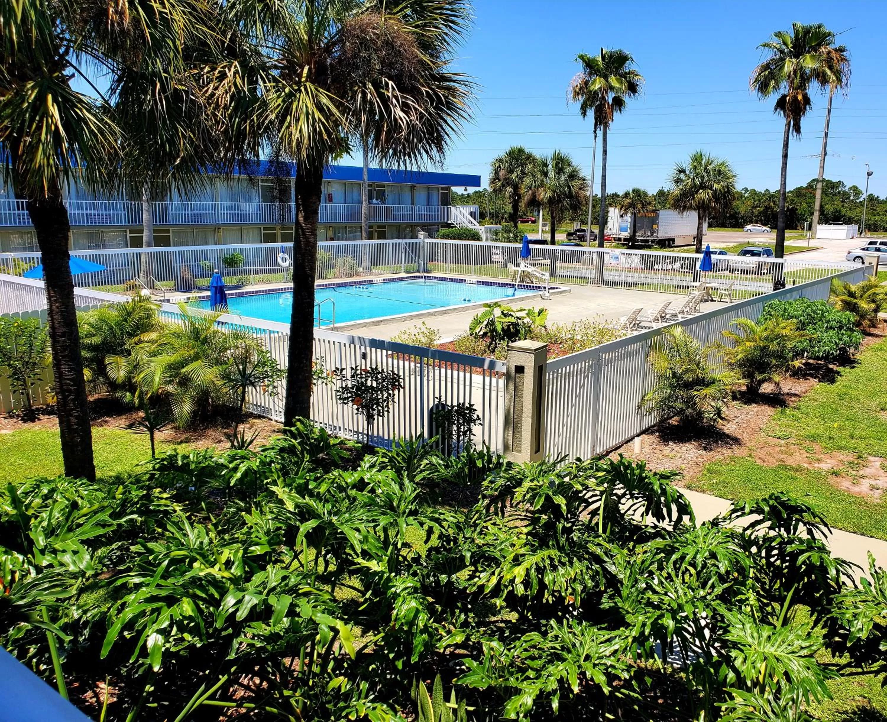 Pool view in Days Inn by Wyndham Titusville Kennedy Space Center