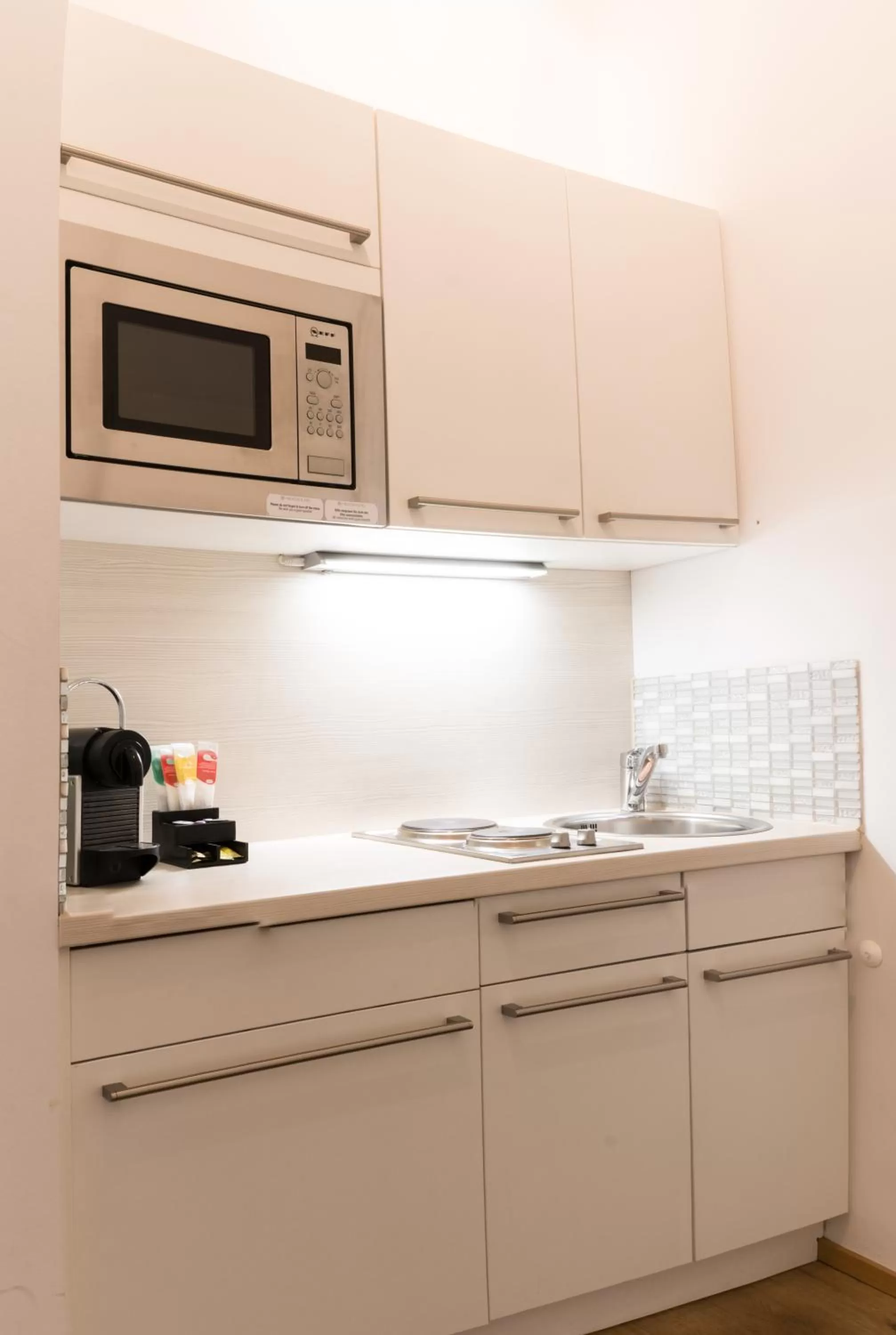 Kitchen or kitchenette in Haven Hotels - Helvetia Suites